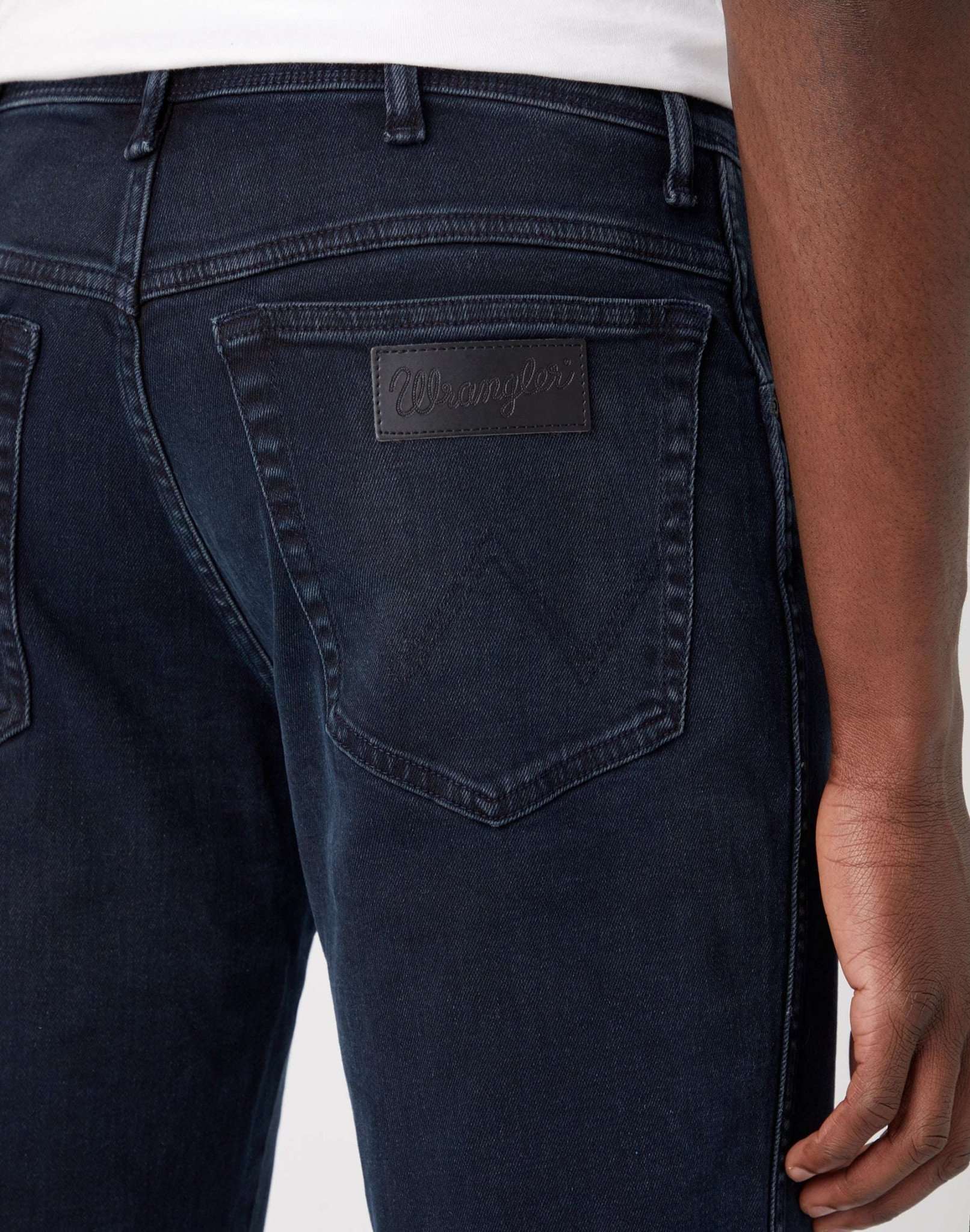 Texas in Travis jeans Wrangler