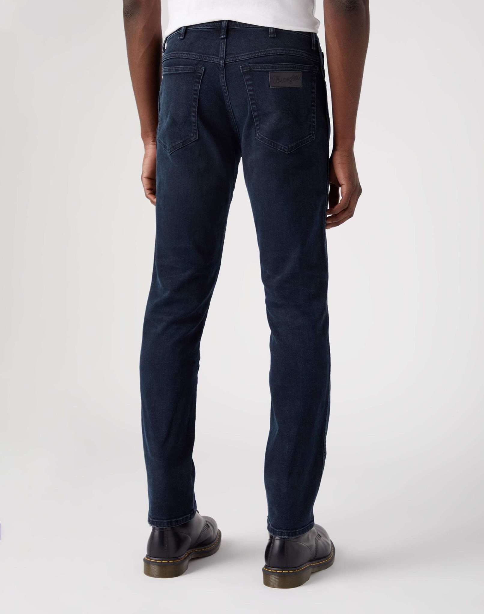 Texas in Travis jeans Wrangler