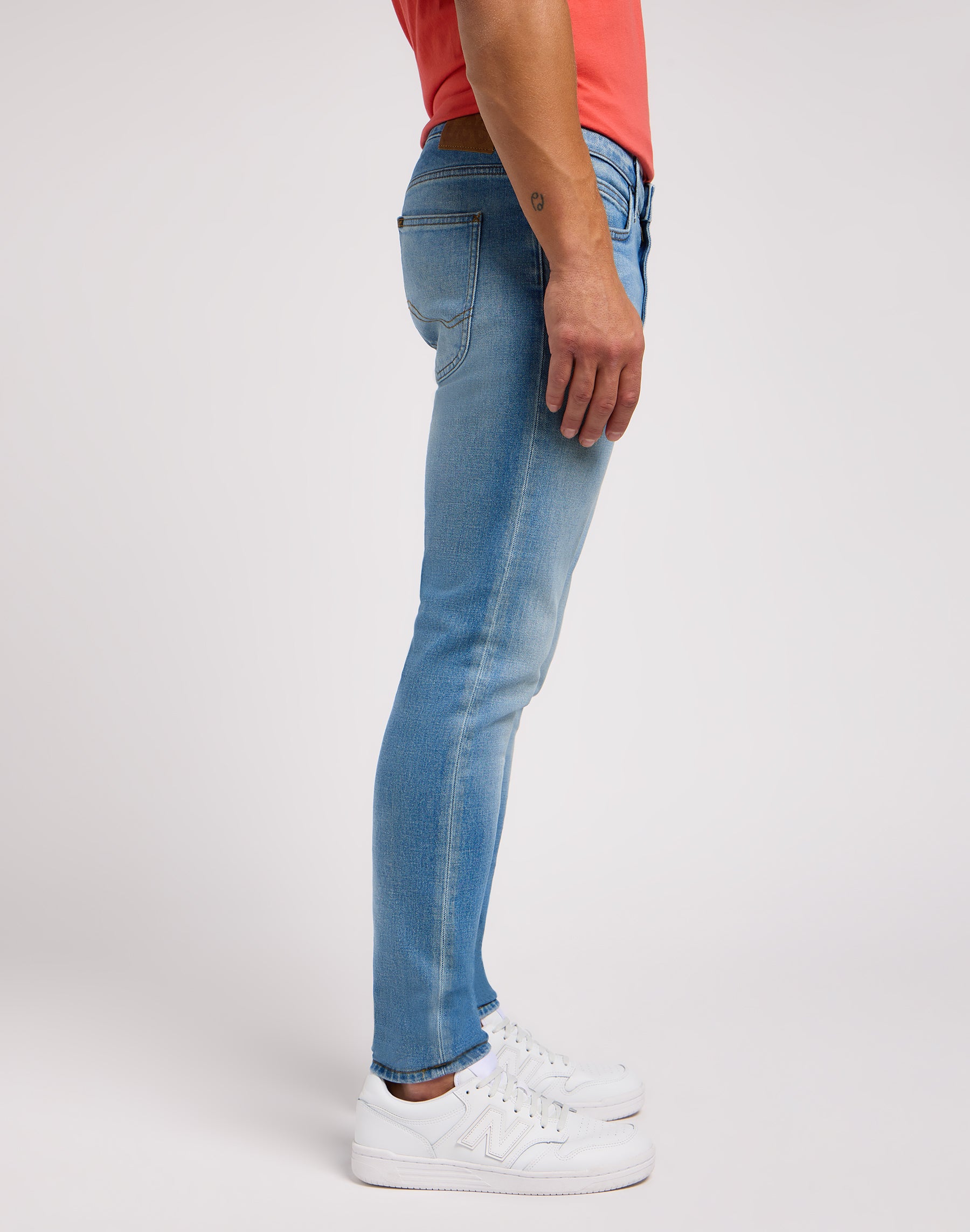 Malone in cold blue jeans Lee