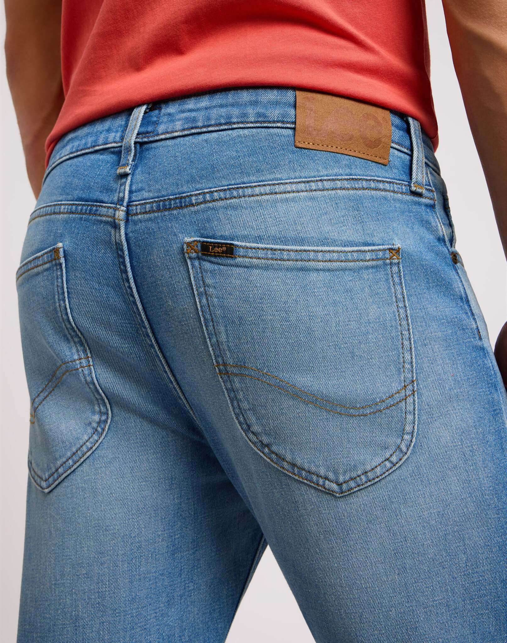 Malone in cold blue jeans Lee