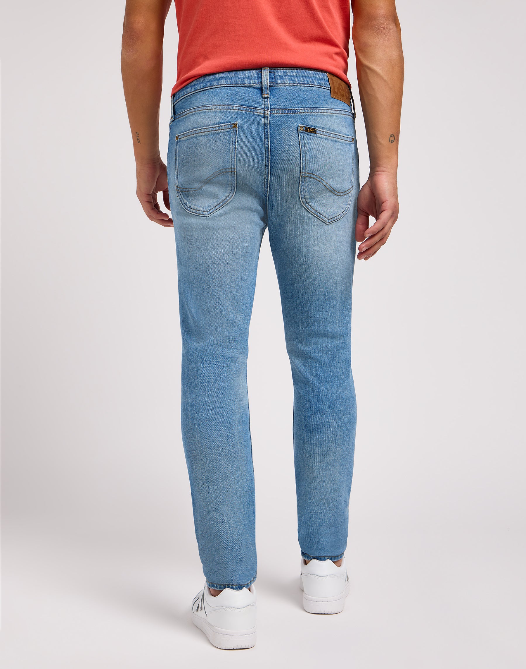 Malone in cold blue jeans Lee