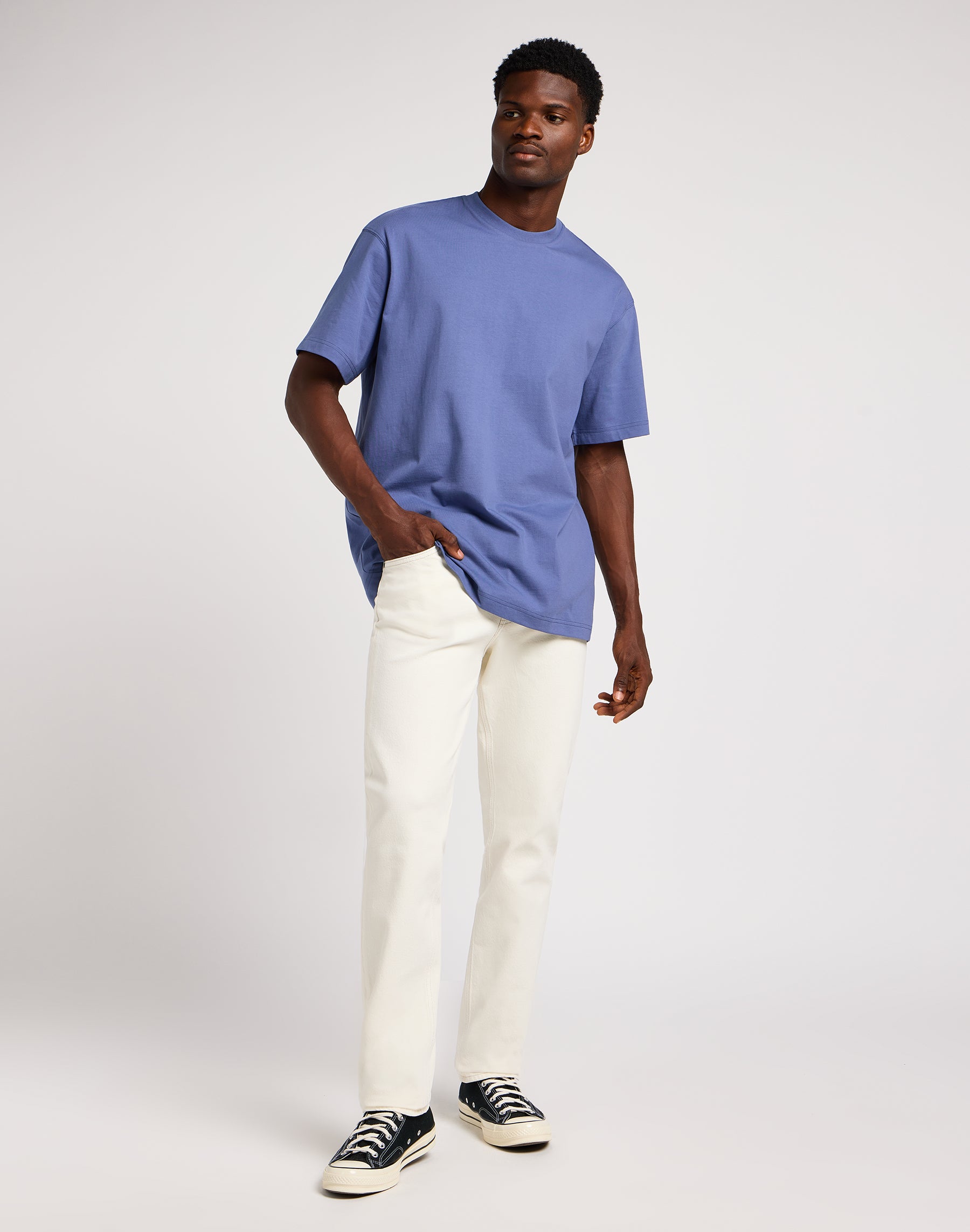 West in off white jeans Lee