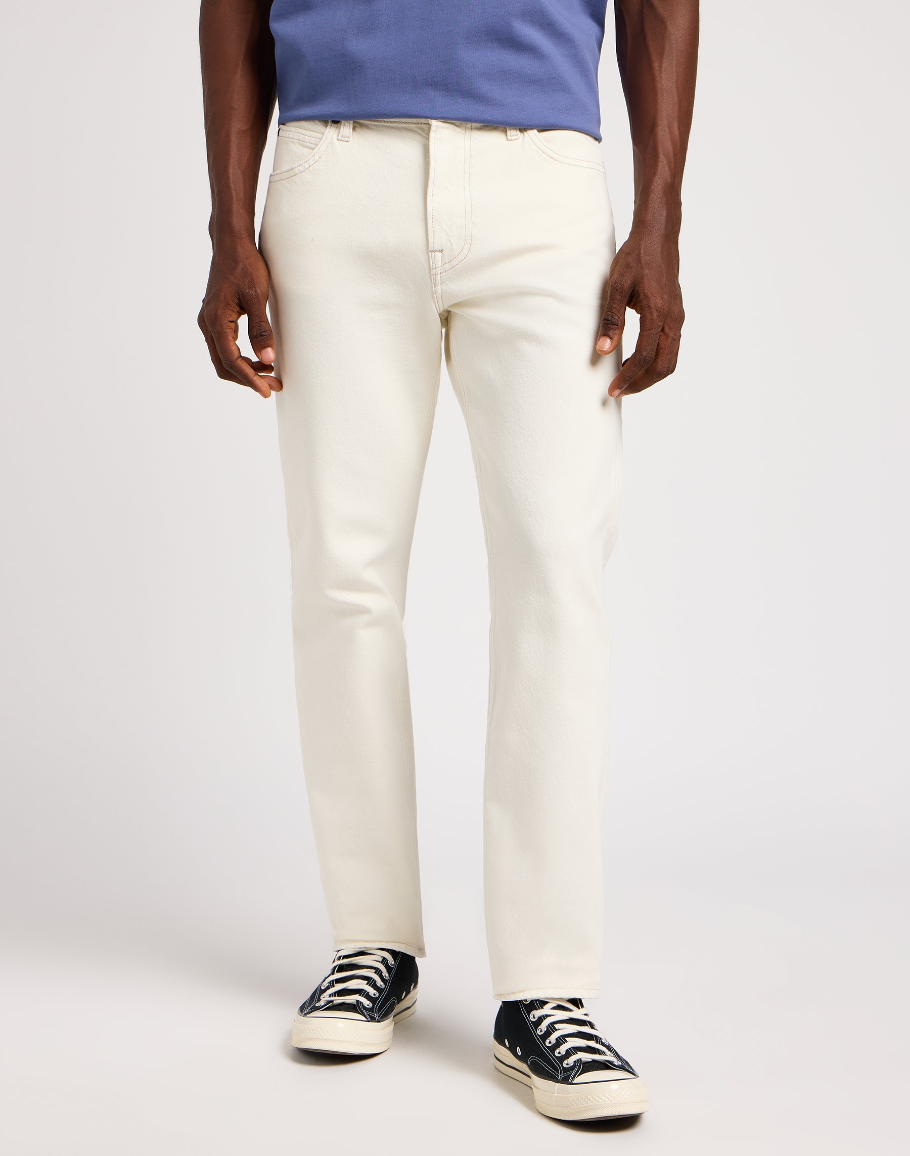 West in off white jeans Lee