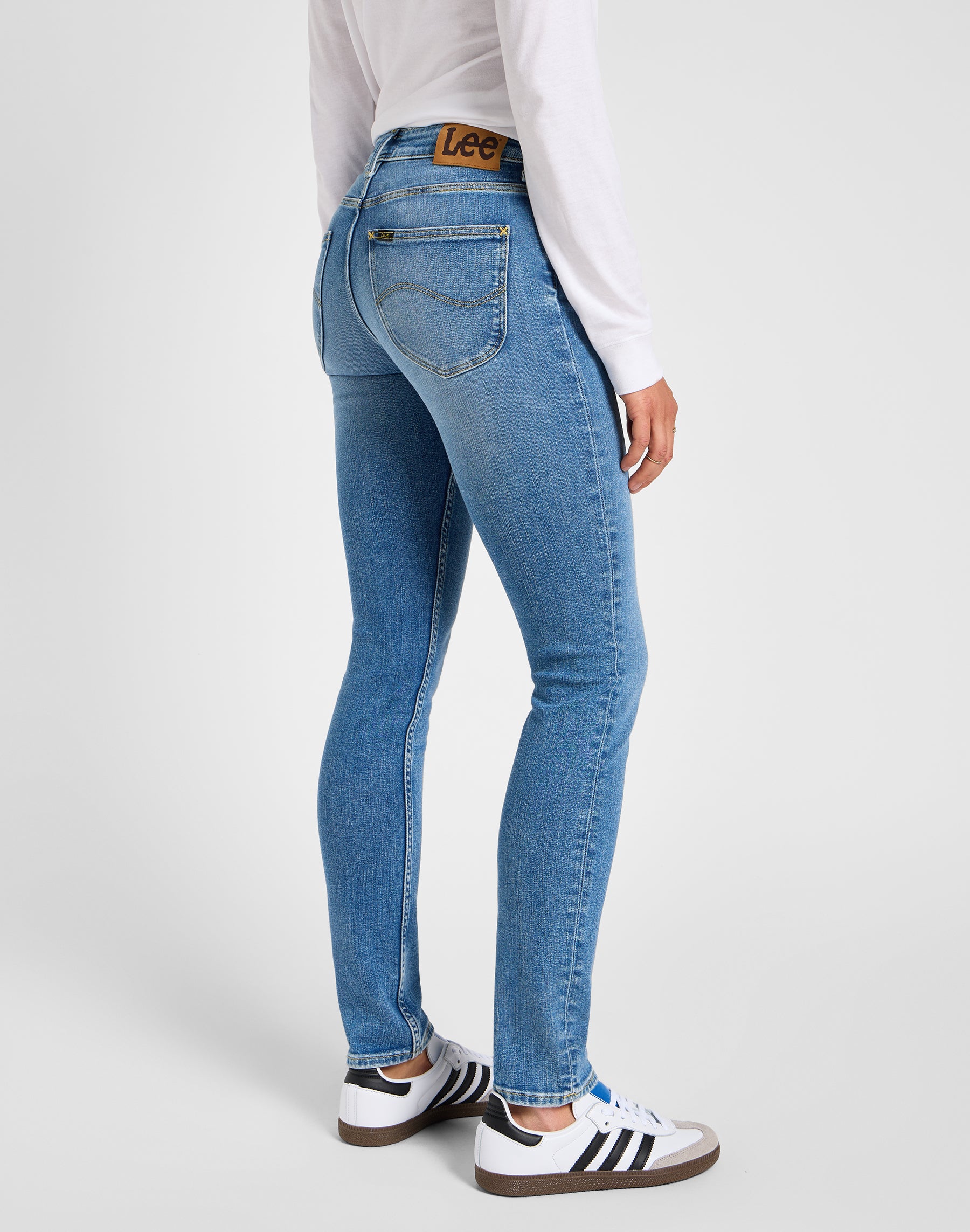 Elly in holding back jeans Lee