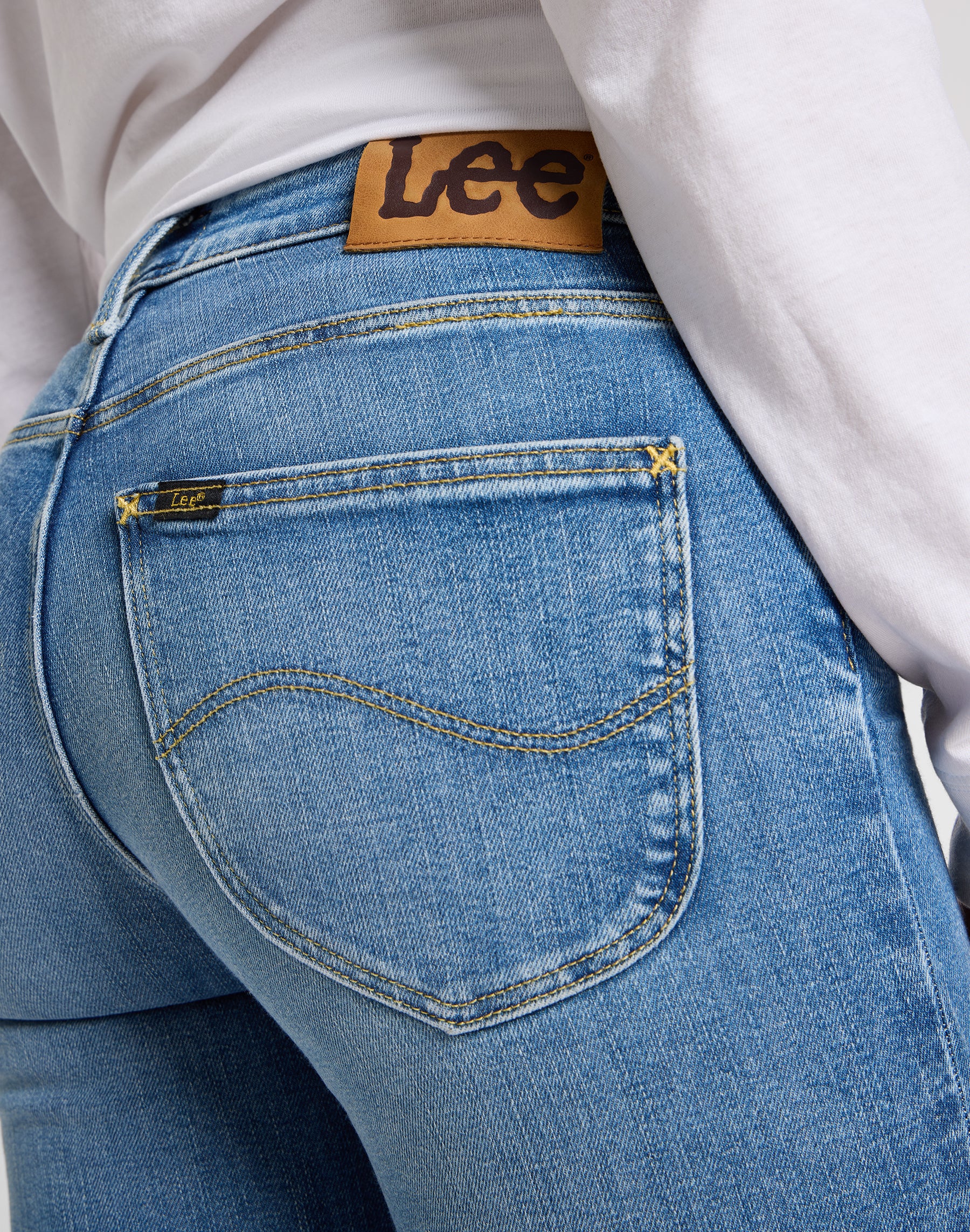 Elly in holding back jeans Lee