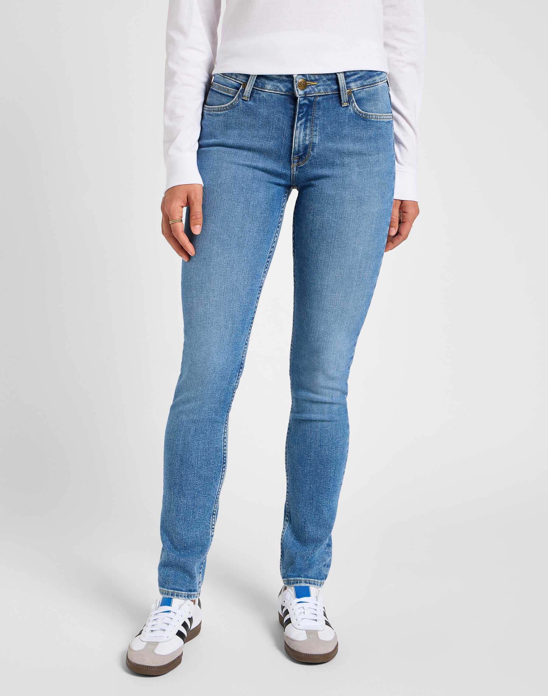 Elly in holding back jeans Lee
