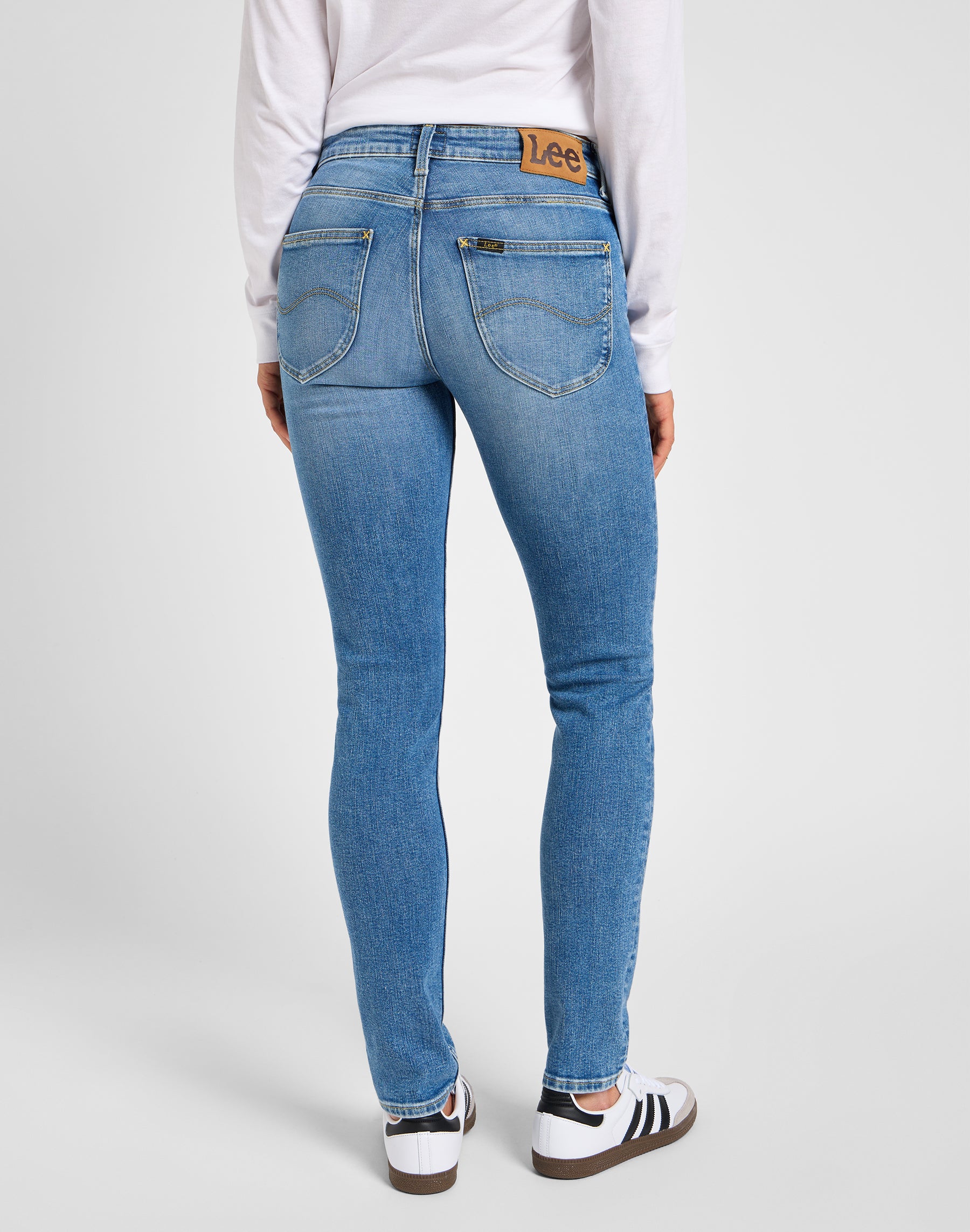 Elly in holding back jeans Lee