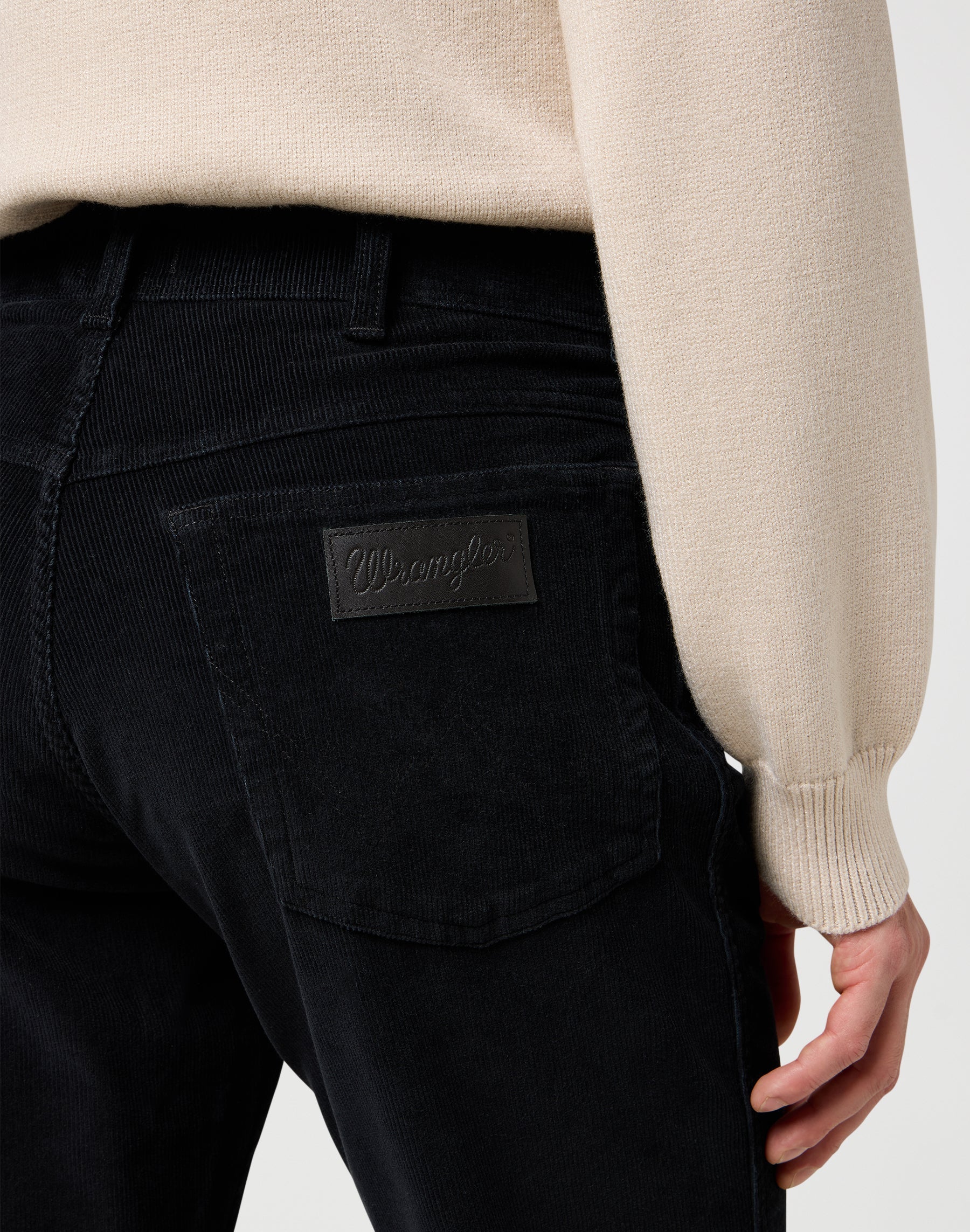 Texas in Black pants Wrangler