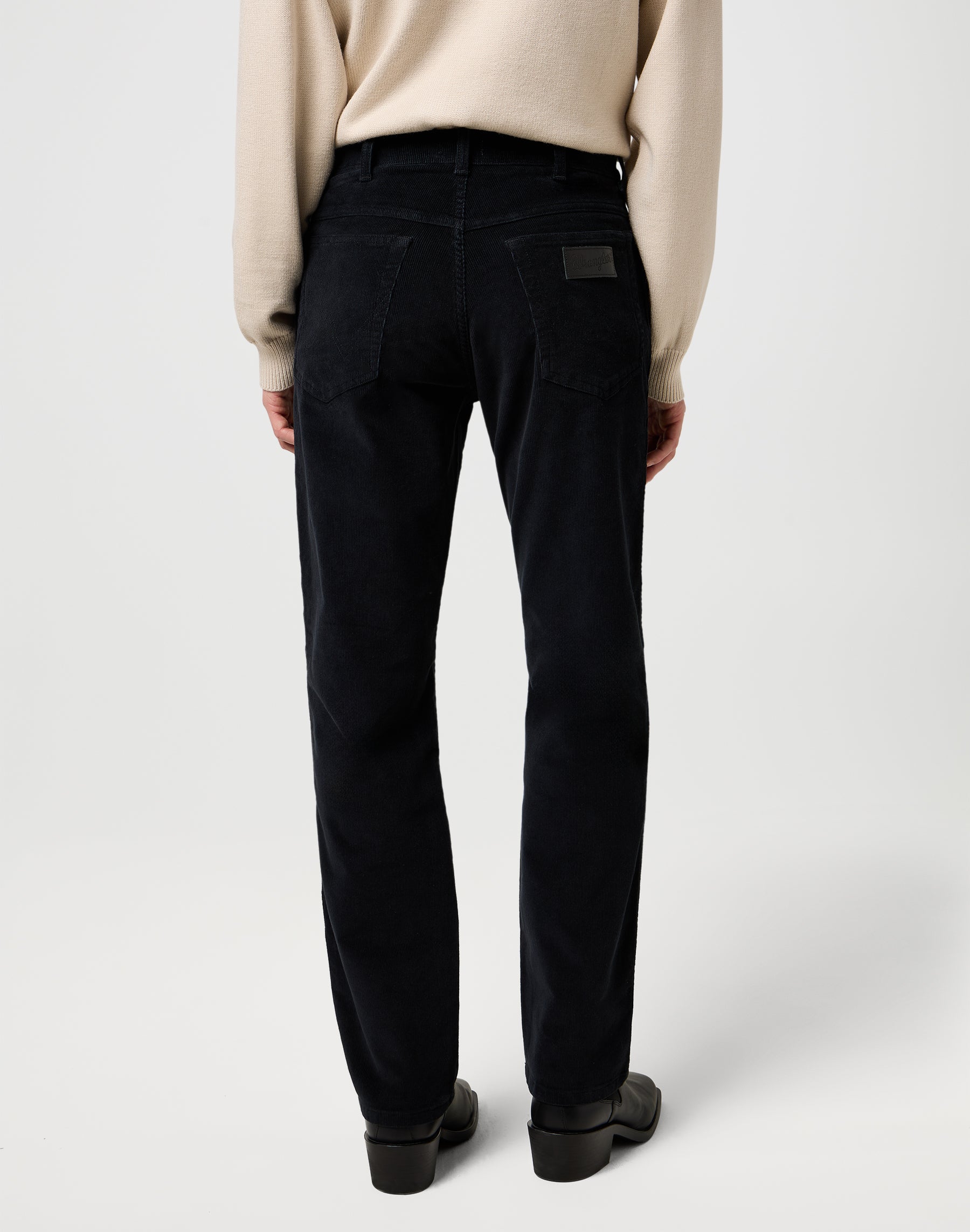 Texas in Black pants Wrangler
