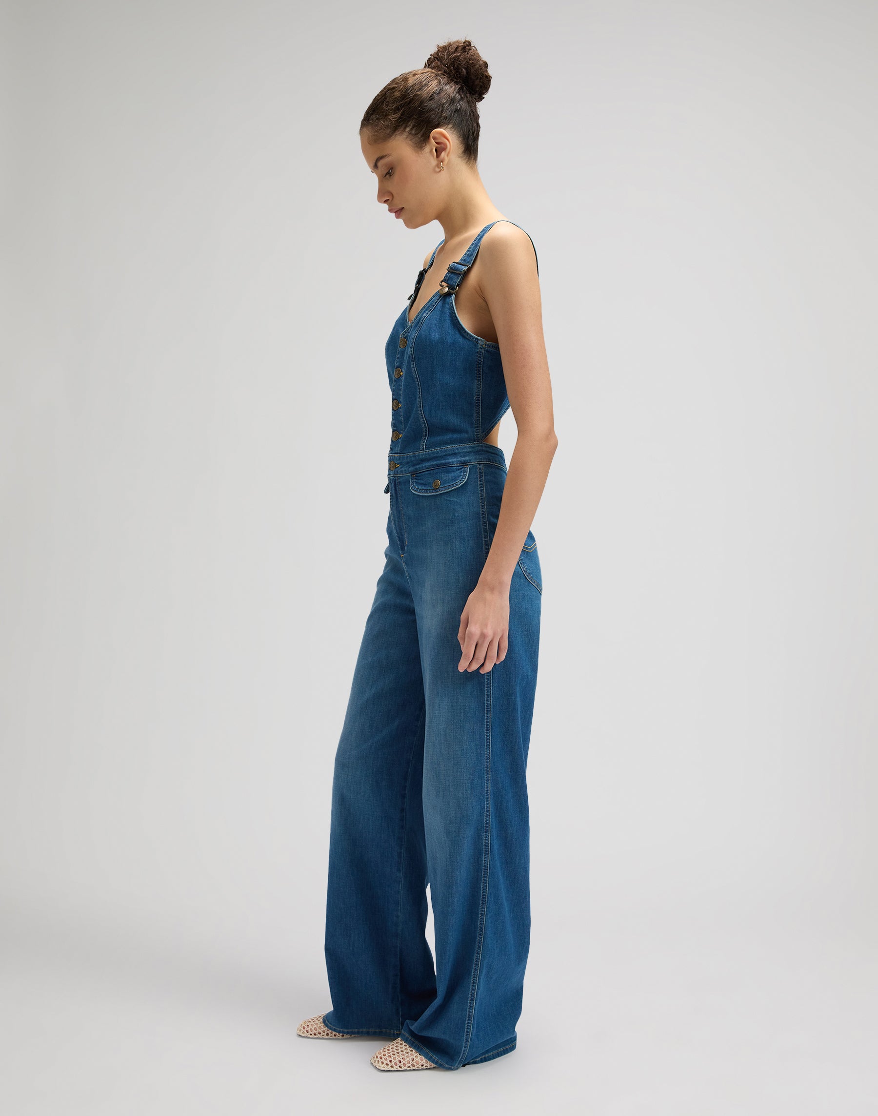 Cut-out jumpsuit in blue arrow overall Lee