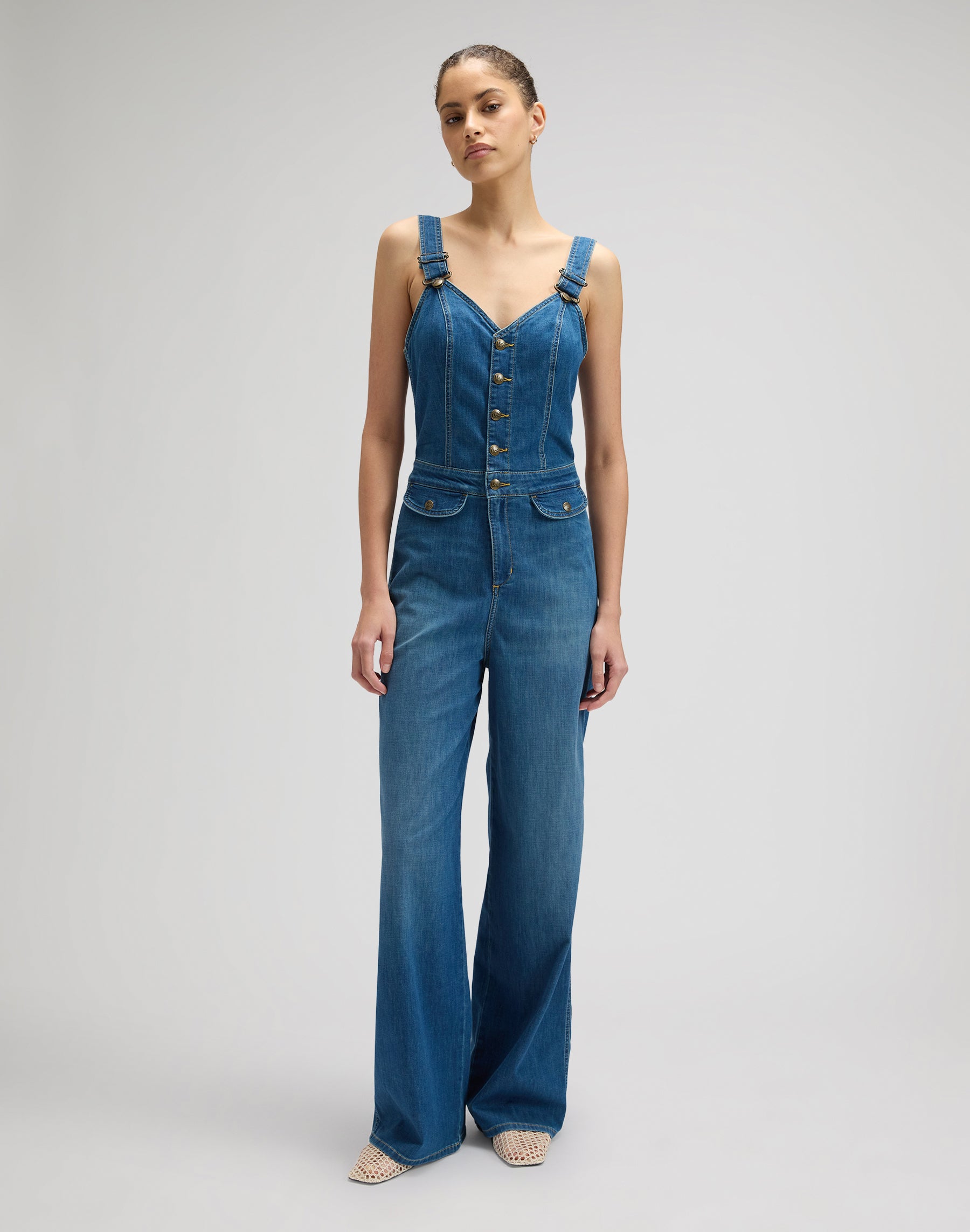 Cut-out jumpsuit in blue arrow overall Lee