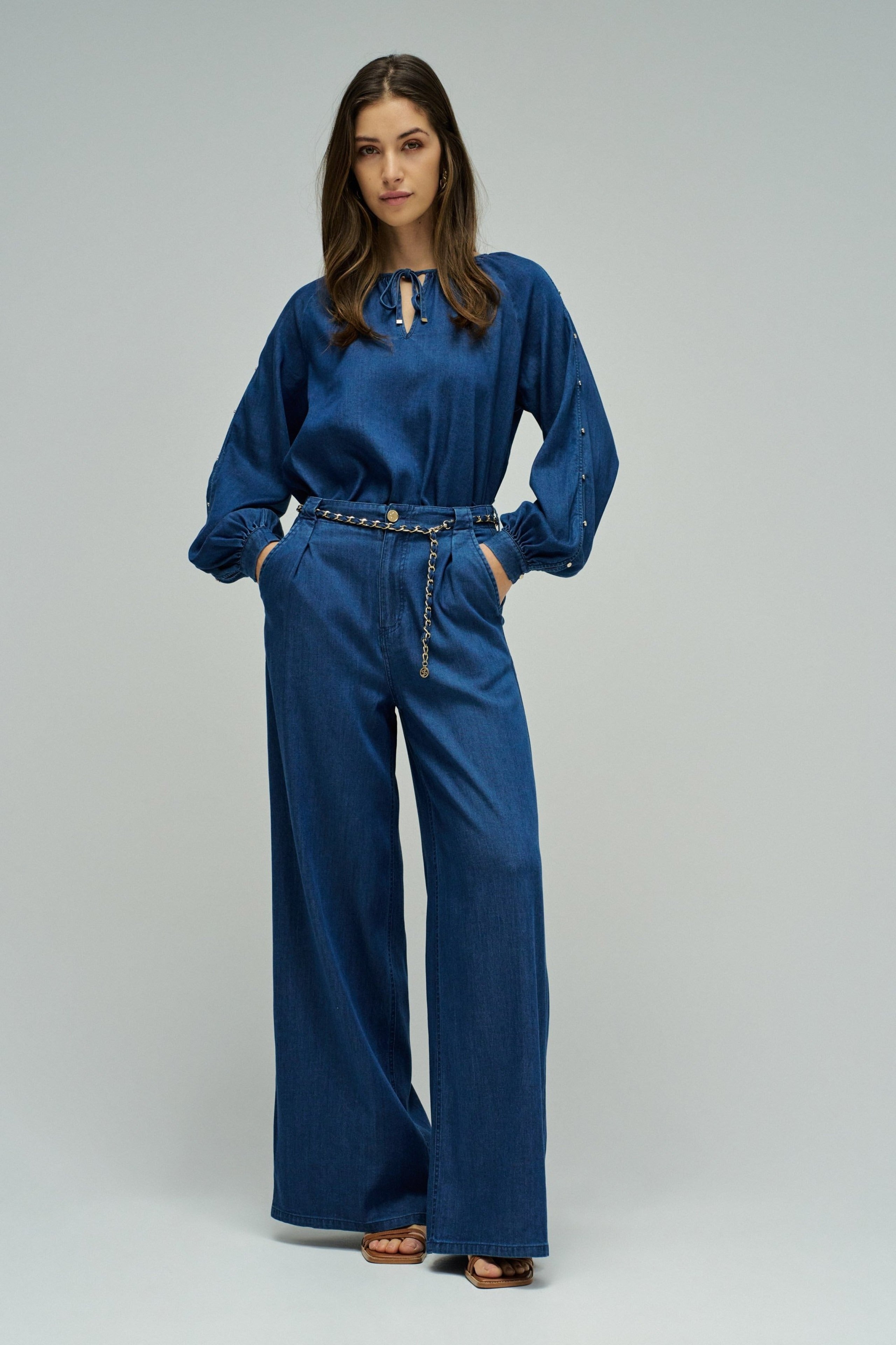 Blouse sleeve detail in dark wash