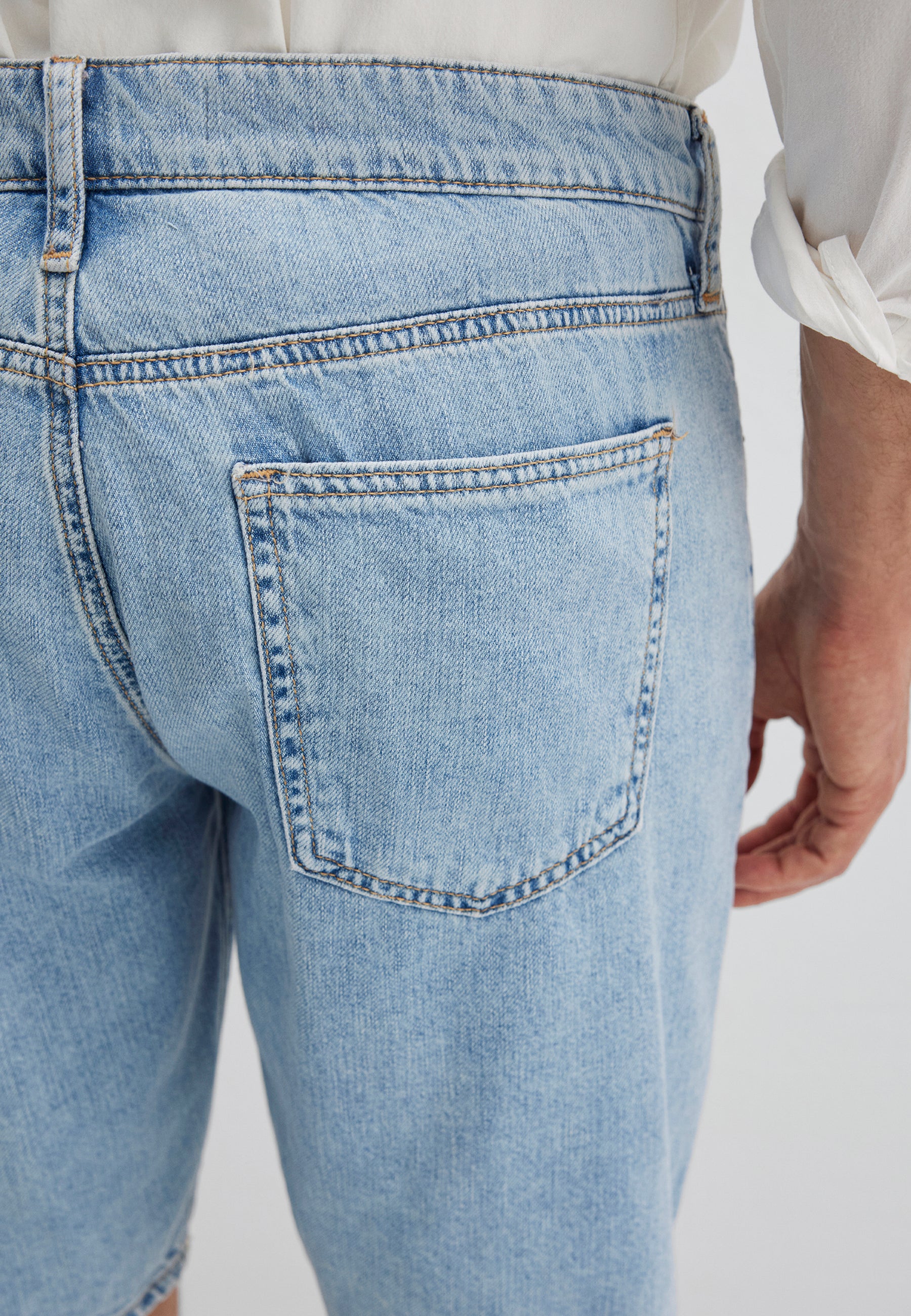 Lucas in Dusty Vintage 90s denim shorts Mavi