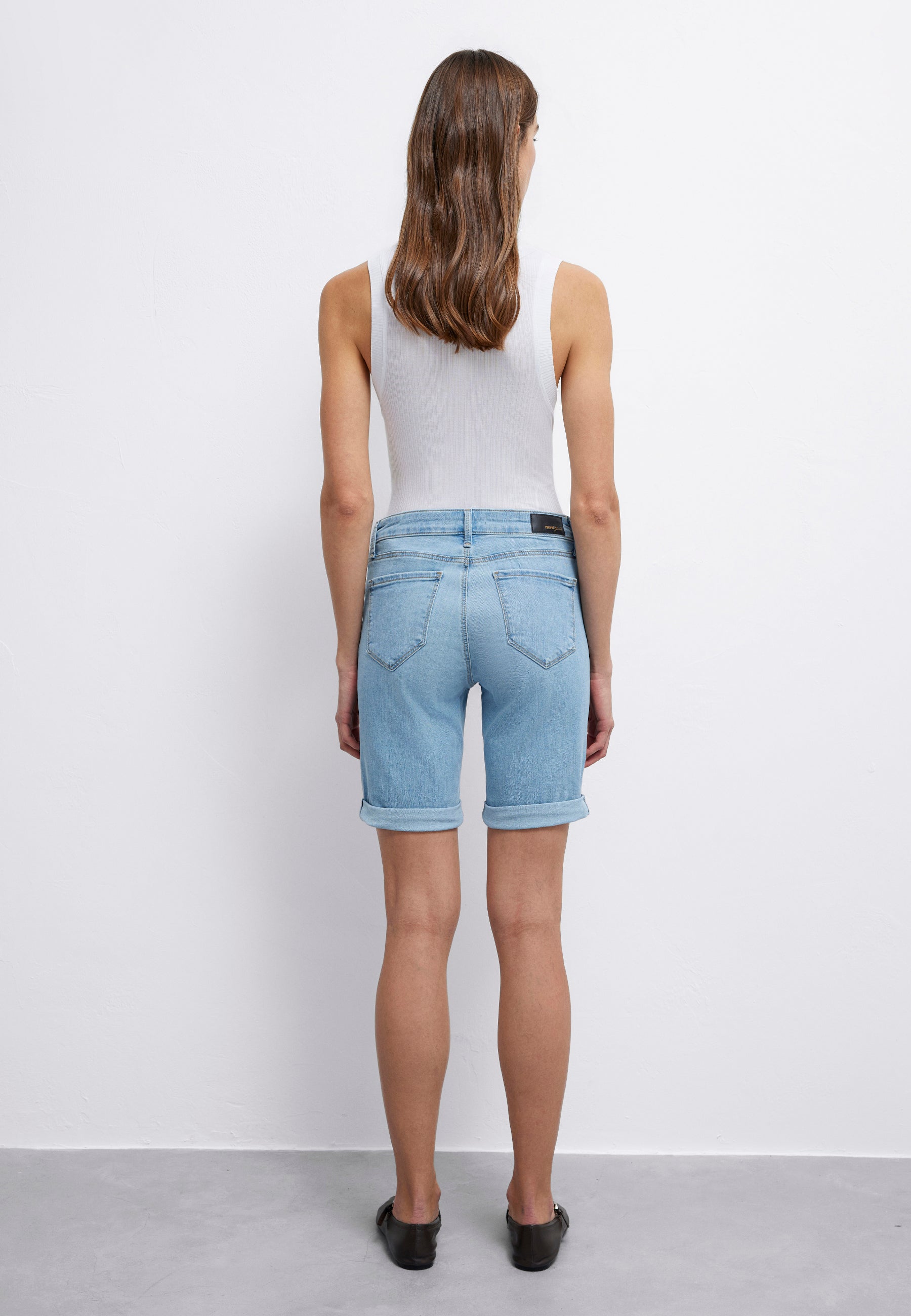 Alexis in Lt Blue Gold denim shorts Mavi