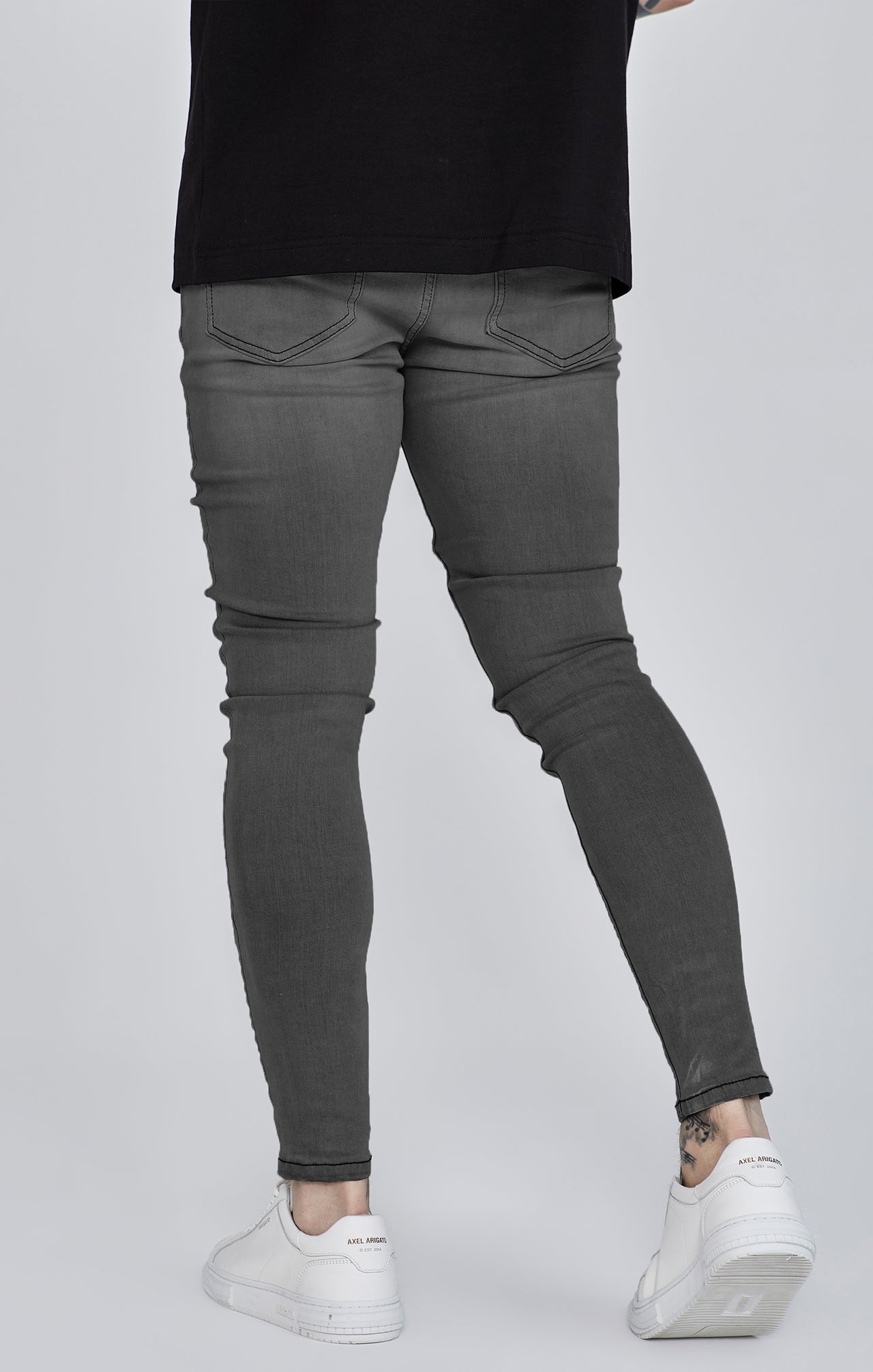 Distressed skinny jeans in gray Jeans SikSilk