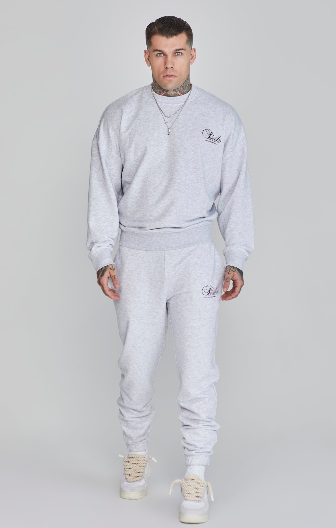 Logo Joggers in Snow Marl Pants SikSilk