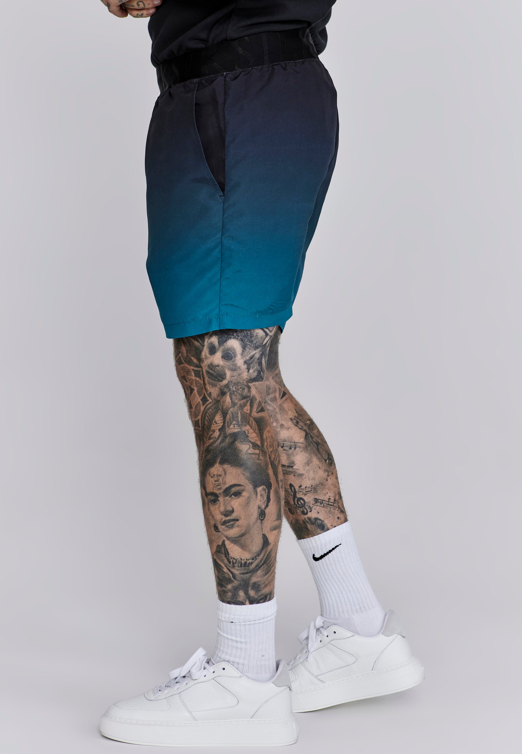 Fade Swim Shorts in Black, Teal Swimming Trunks SikSilk