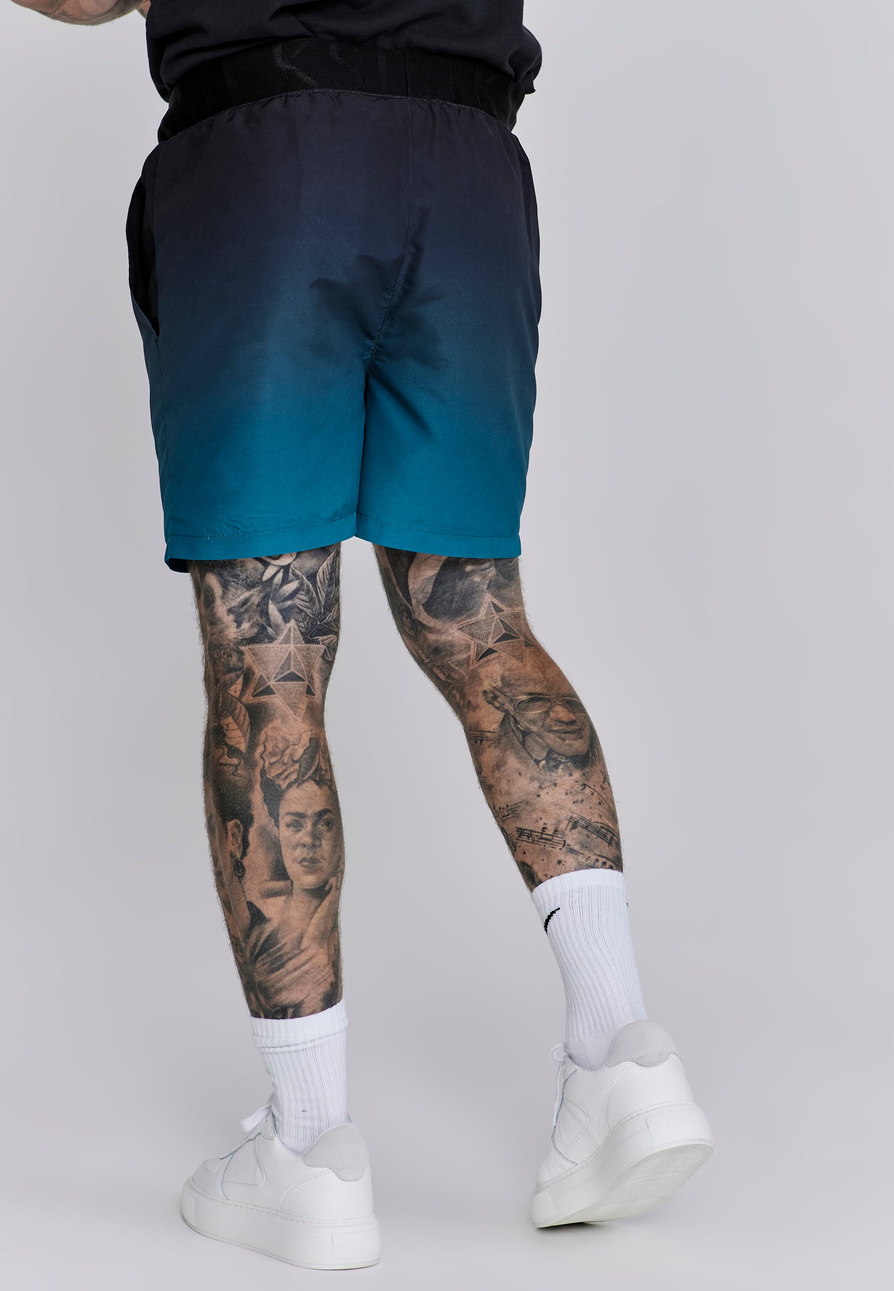Fade Swim Shorts in Black, Teal Swimming Trunks SikSilk