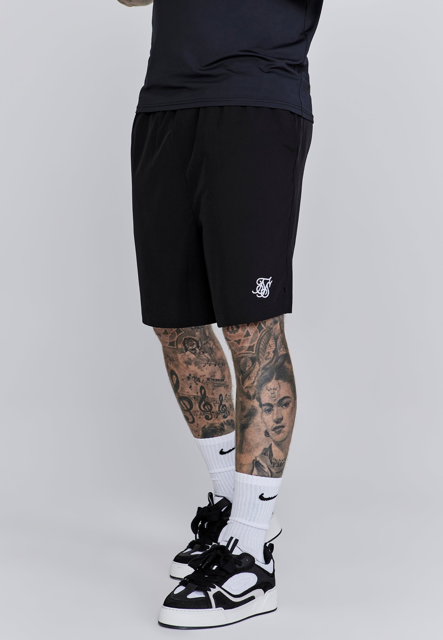 Shorts in Black Shorts SikSilk