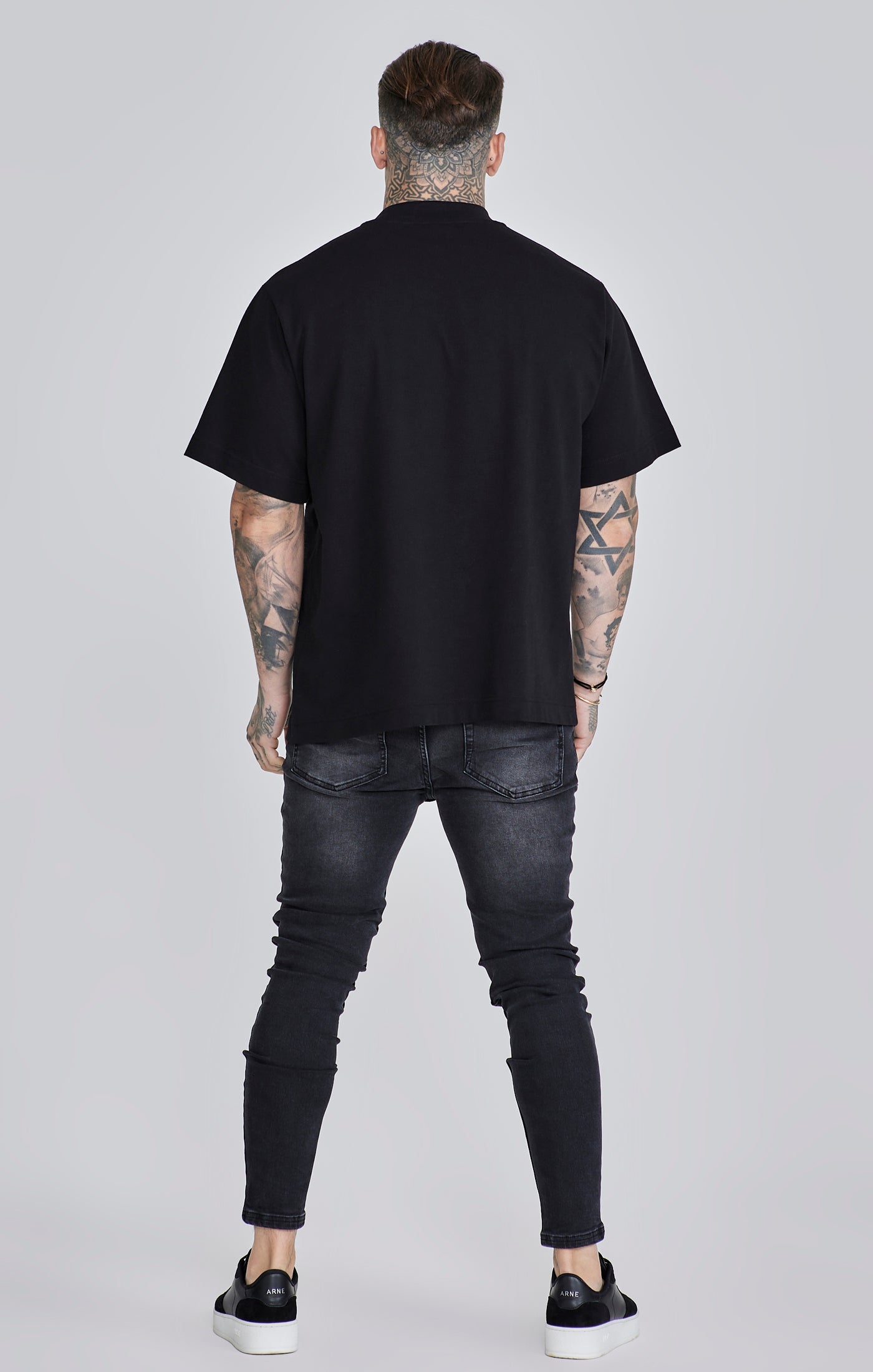 Skinny Jeans in Washed Black Jeans SikSilk