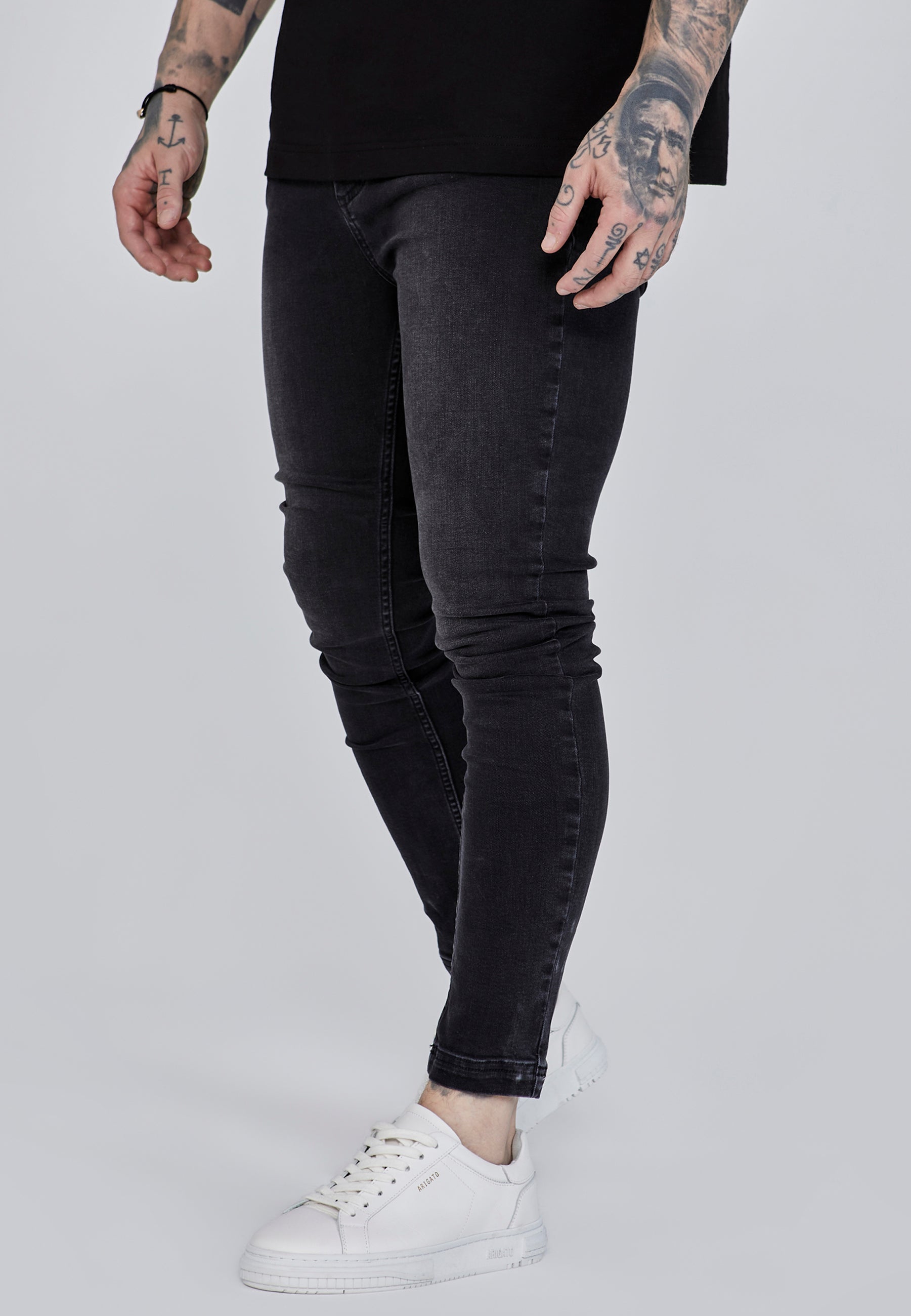 Skinny Jeans in Washed Black Jeans SikSilk