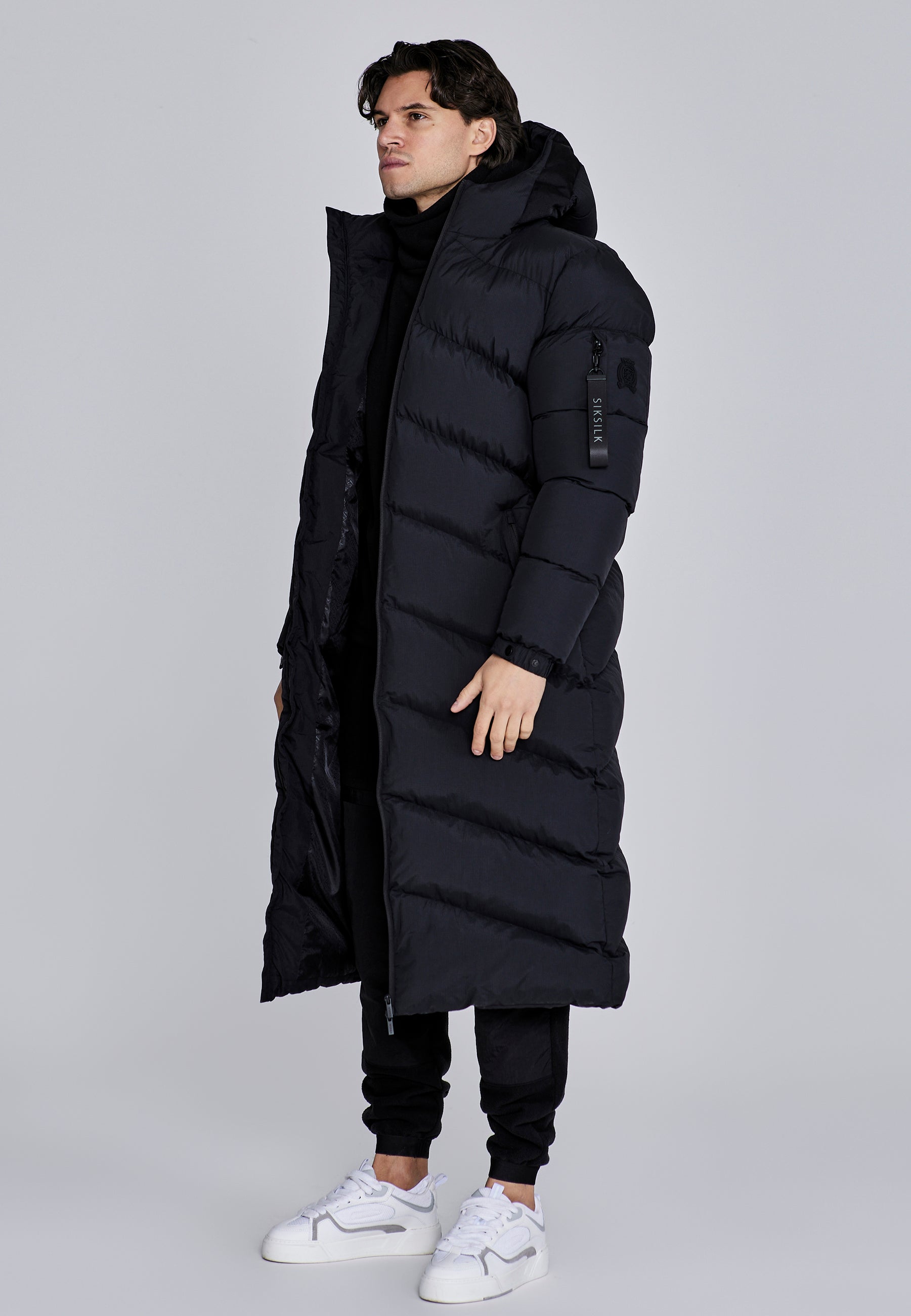 Longline Puffer in Black Jackets SikSilk