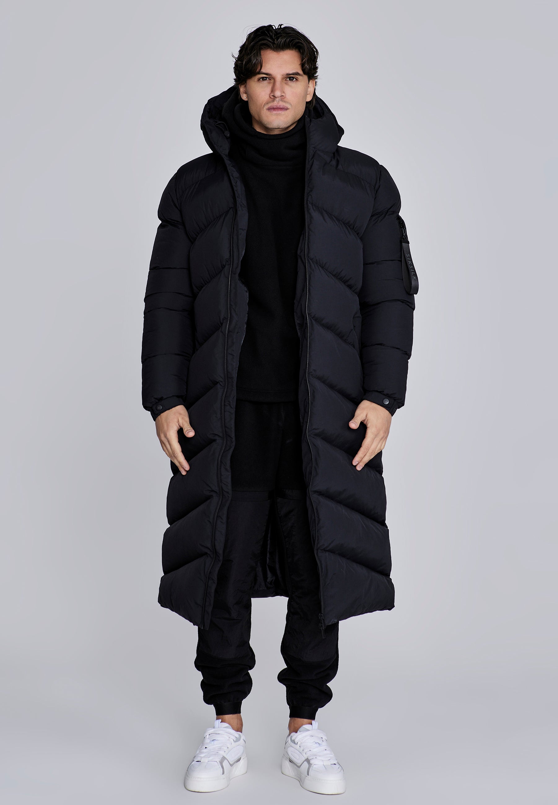 Longline Puffer in Black Jackets SikSilk