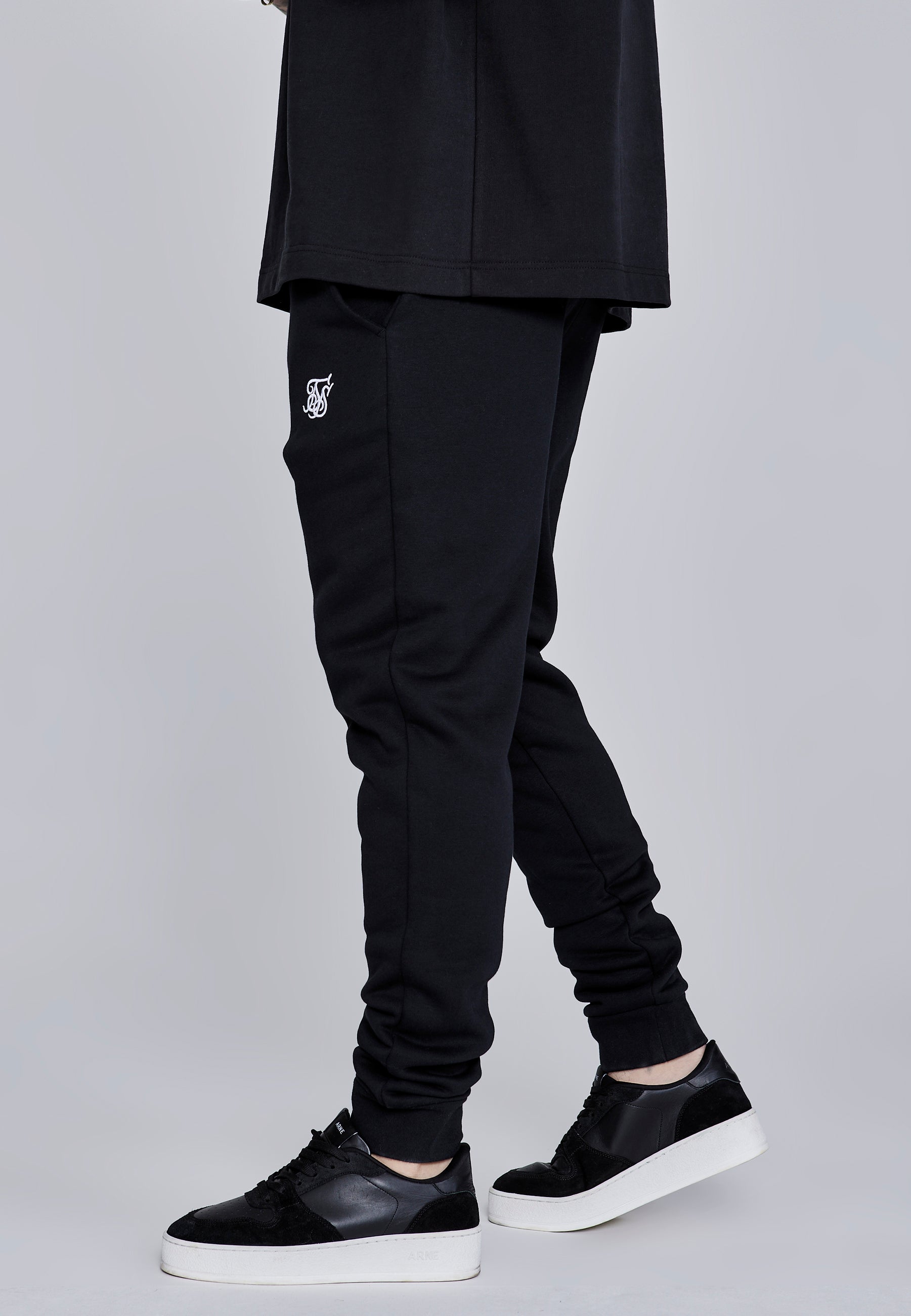 Essentials Joggers in Black Pants SikSilk