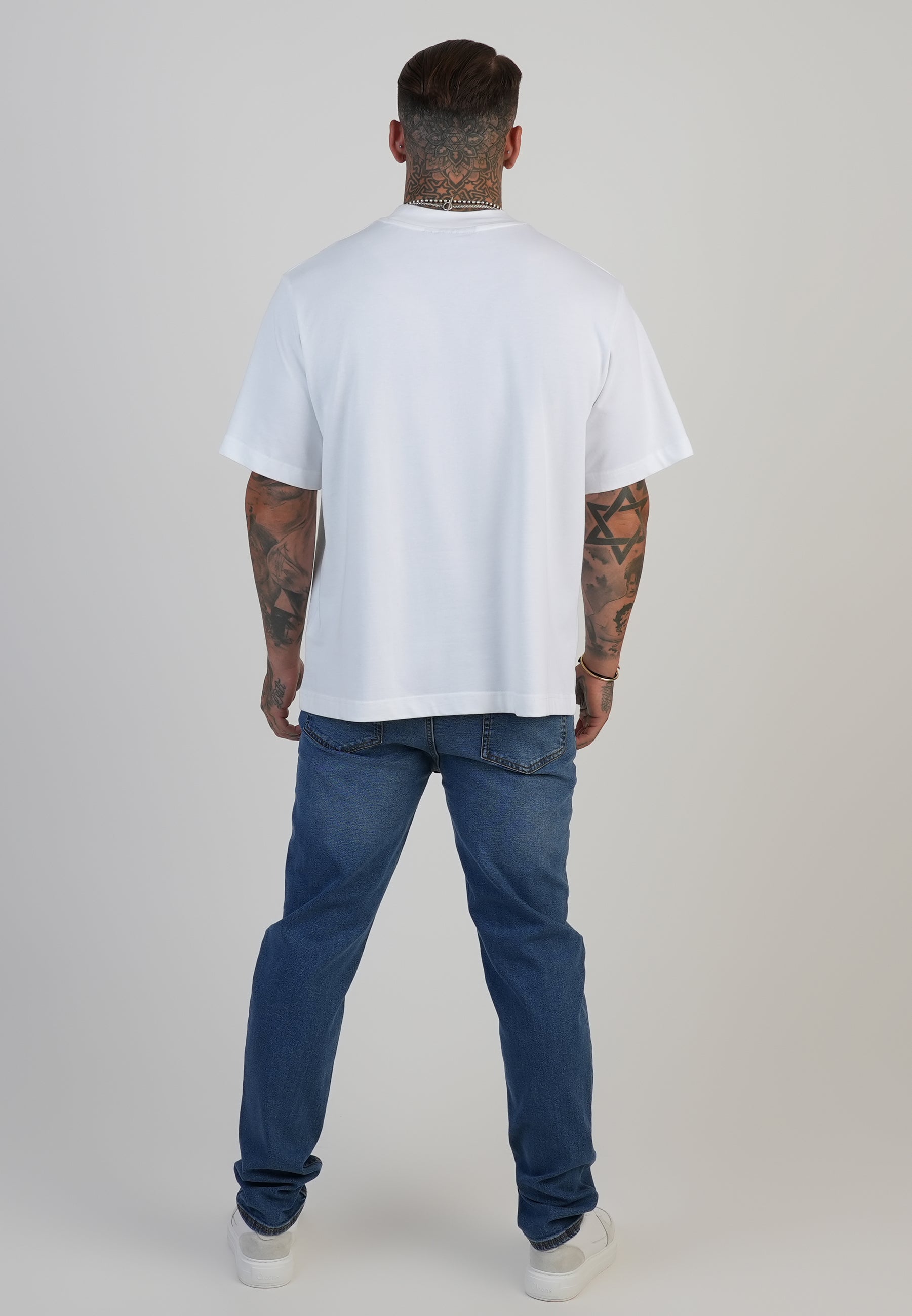 Slim fit jeans in washed mid blue