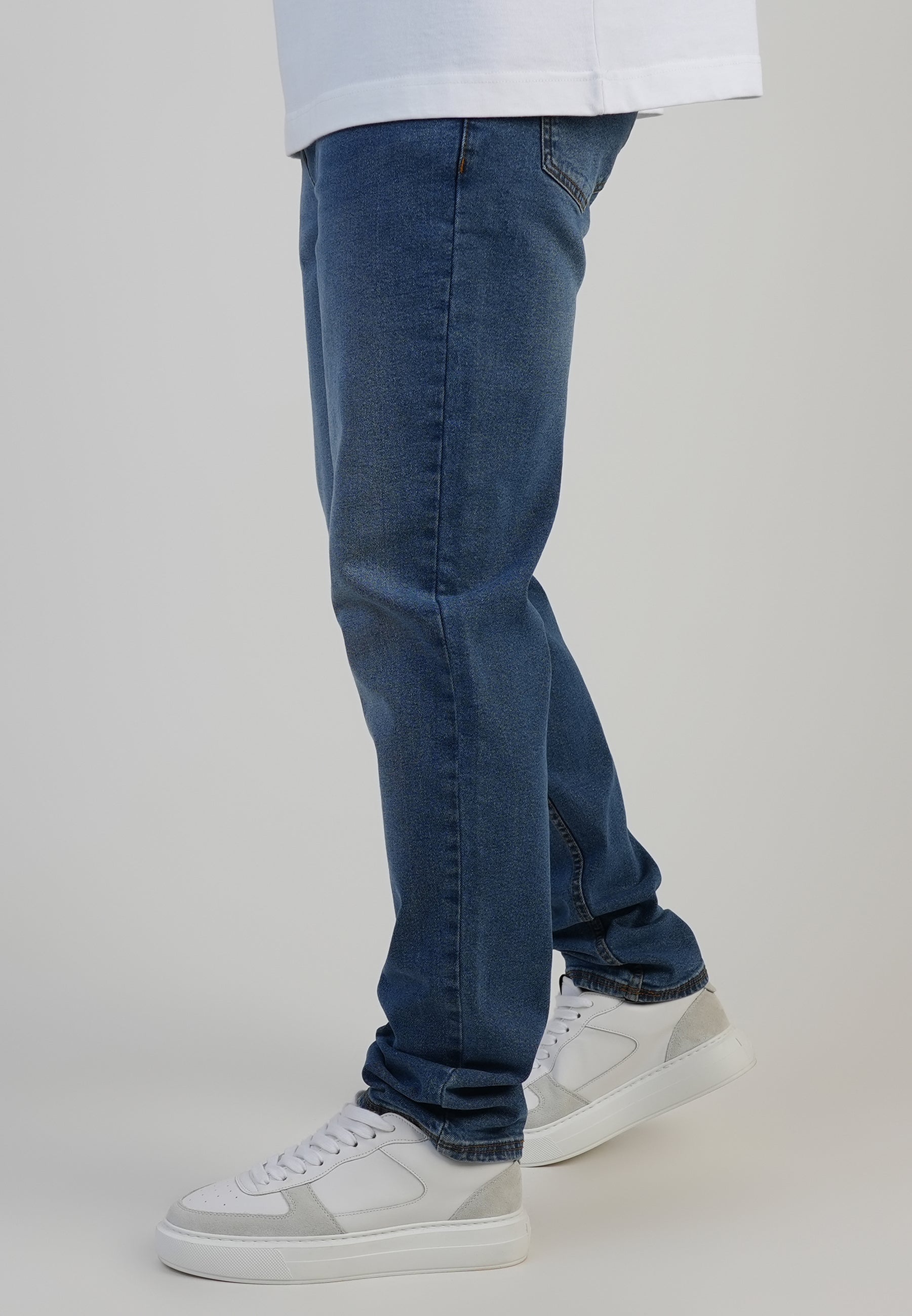 Slim fit jeans in washed mid blue