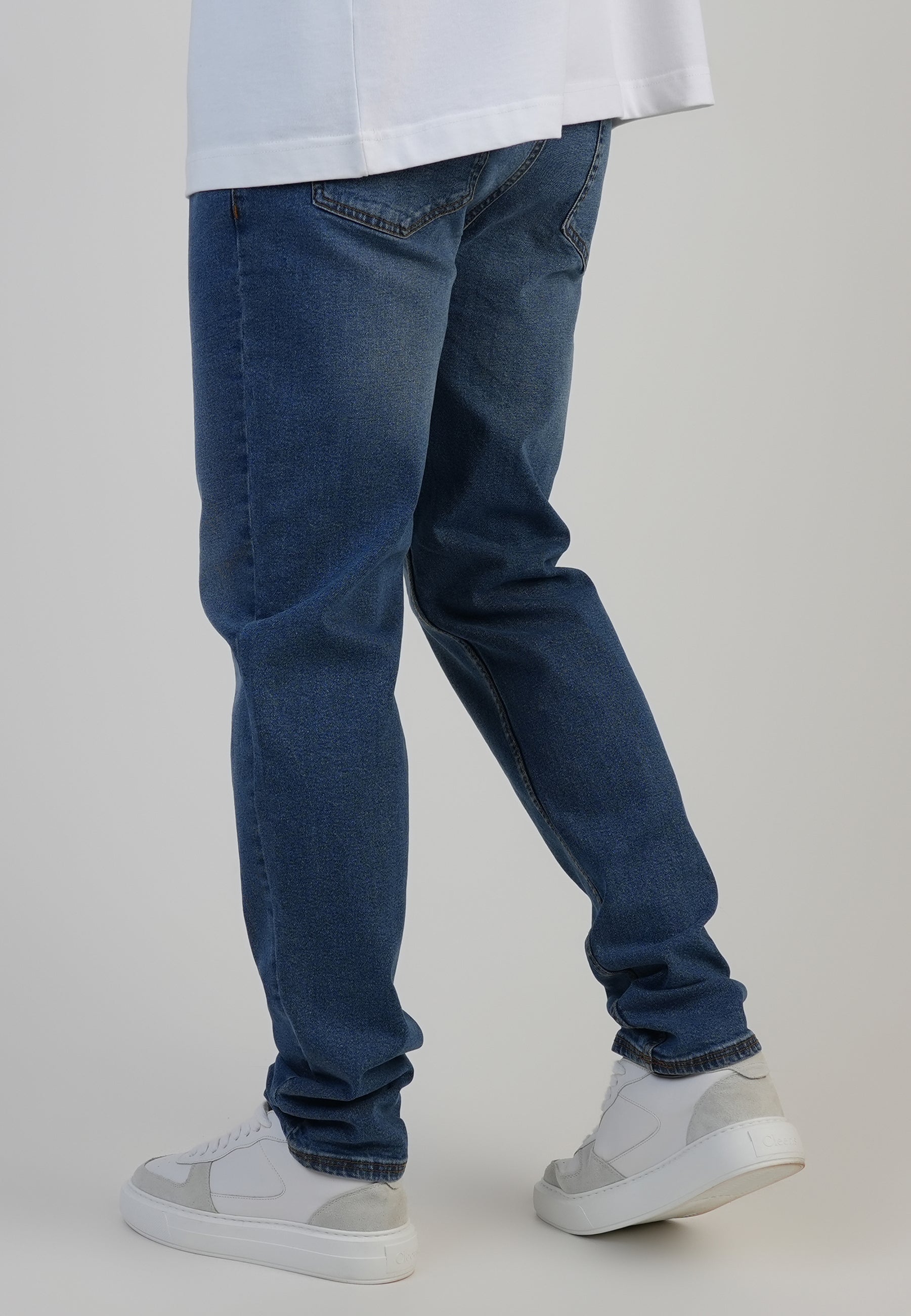 Slim fit jeans in washed mid blue