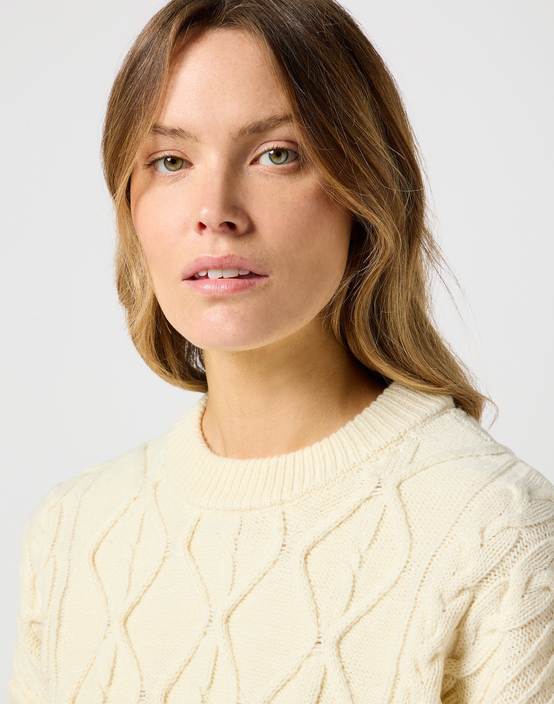 Cable Knit Sweater in Worn White Sweater Wrangler   