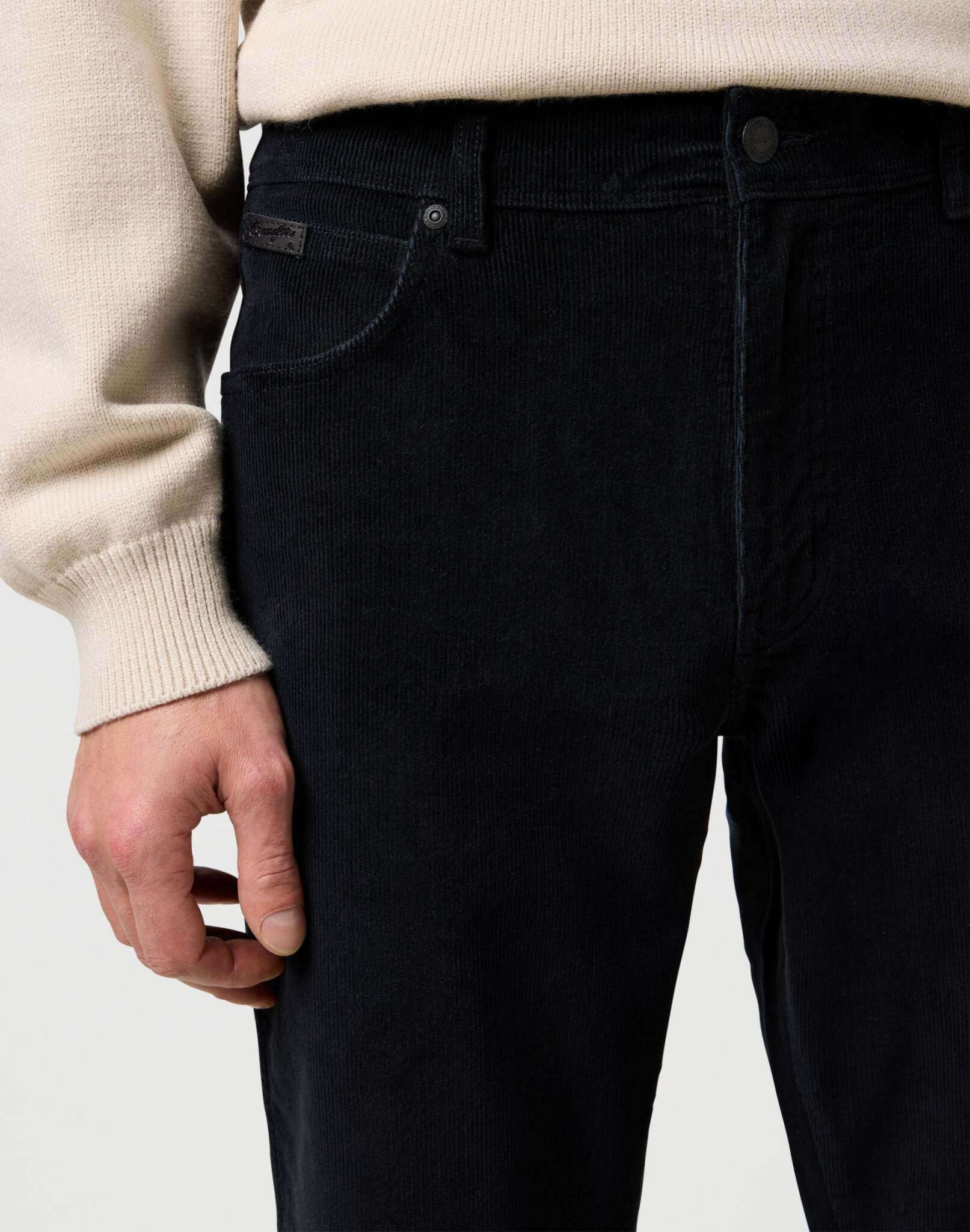 Texas in Black pants Wrangler