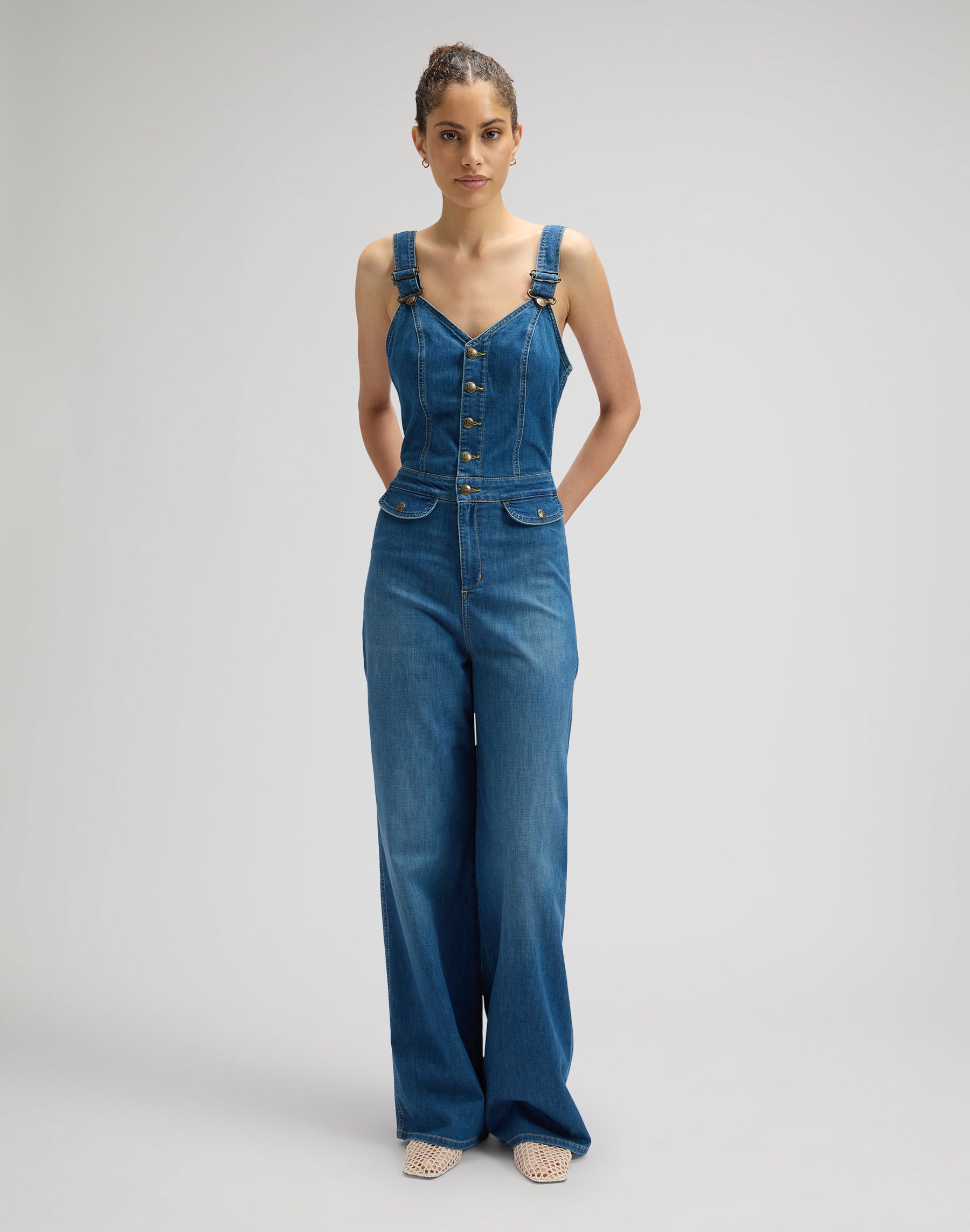 Cut-out jumpsuit in blue arrow overall Lee