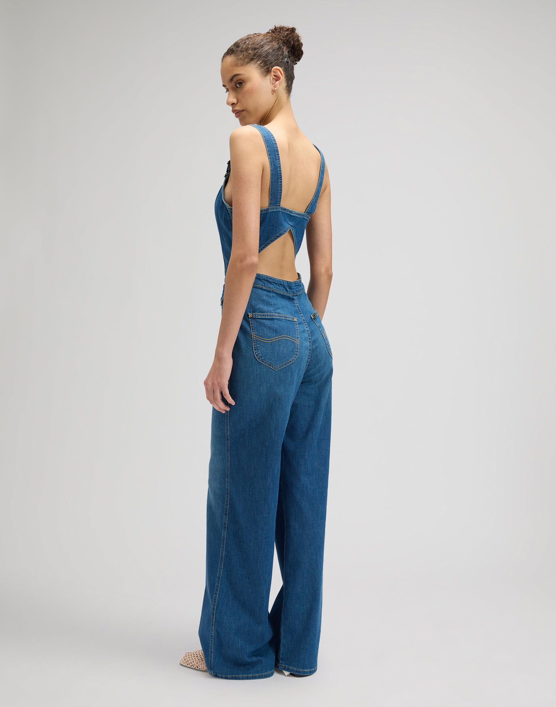 Cut-out jumpsuit in blue arrow overall Lee