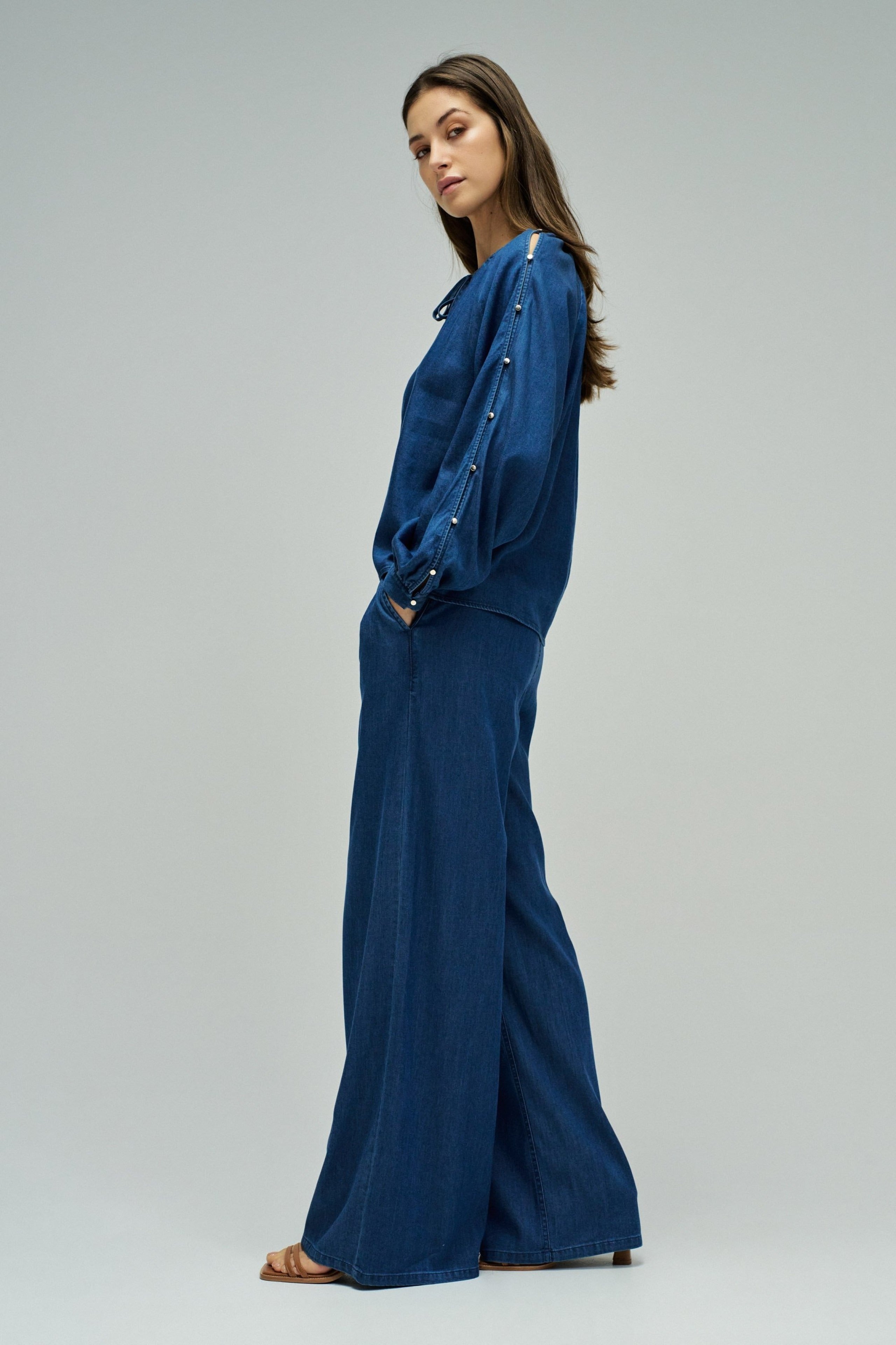 Blouse sleeve detail in dark wash