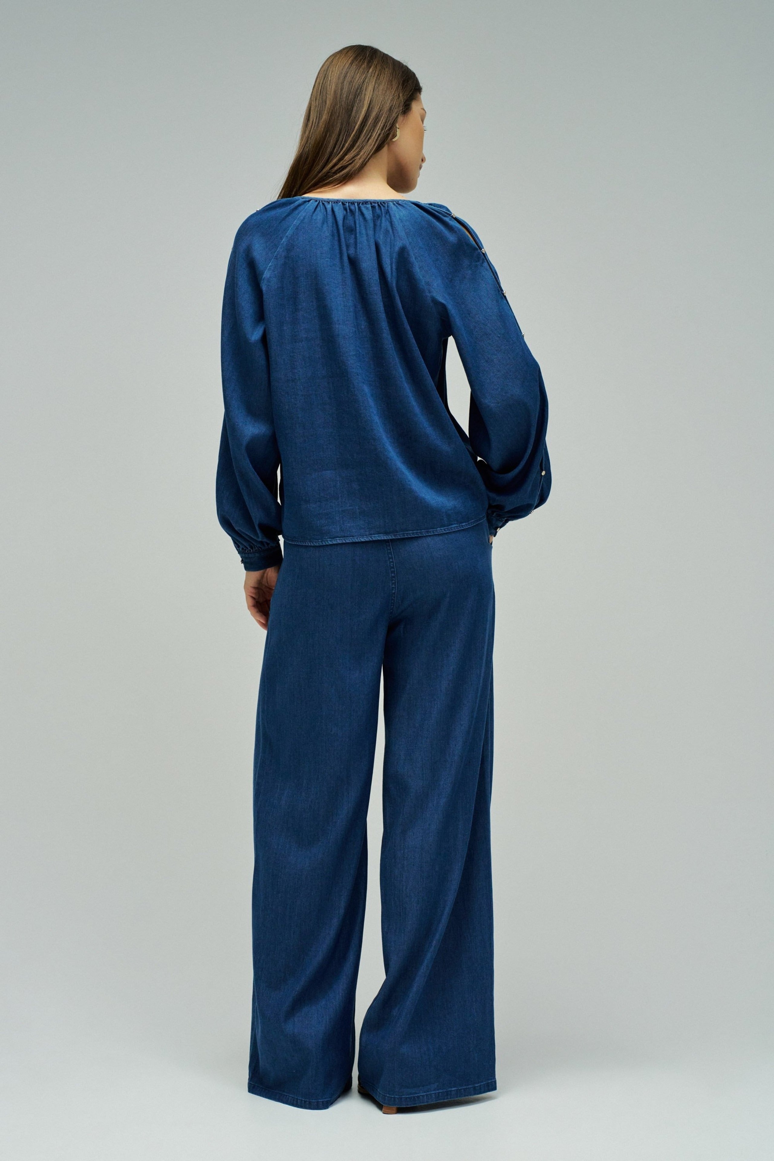 Blouse sleeve detail in dark wash