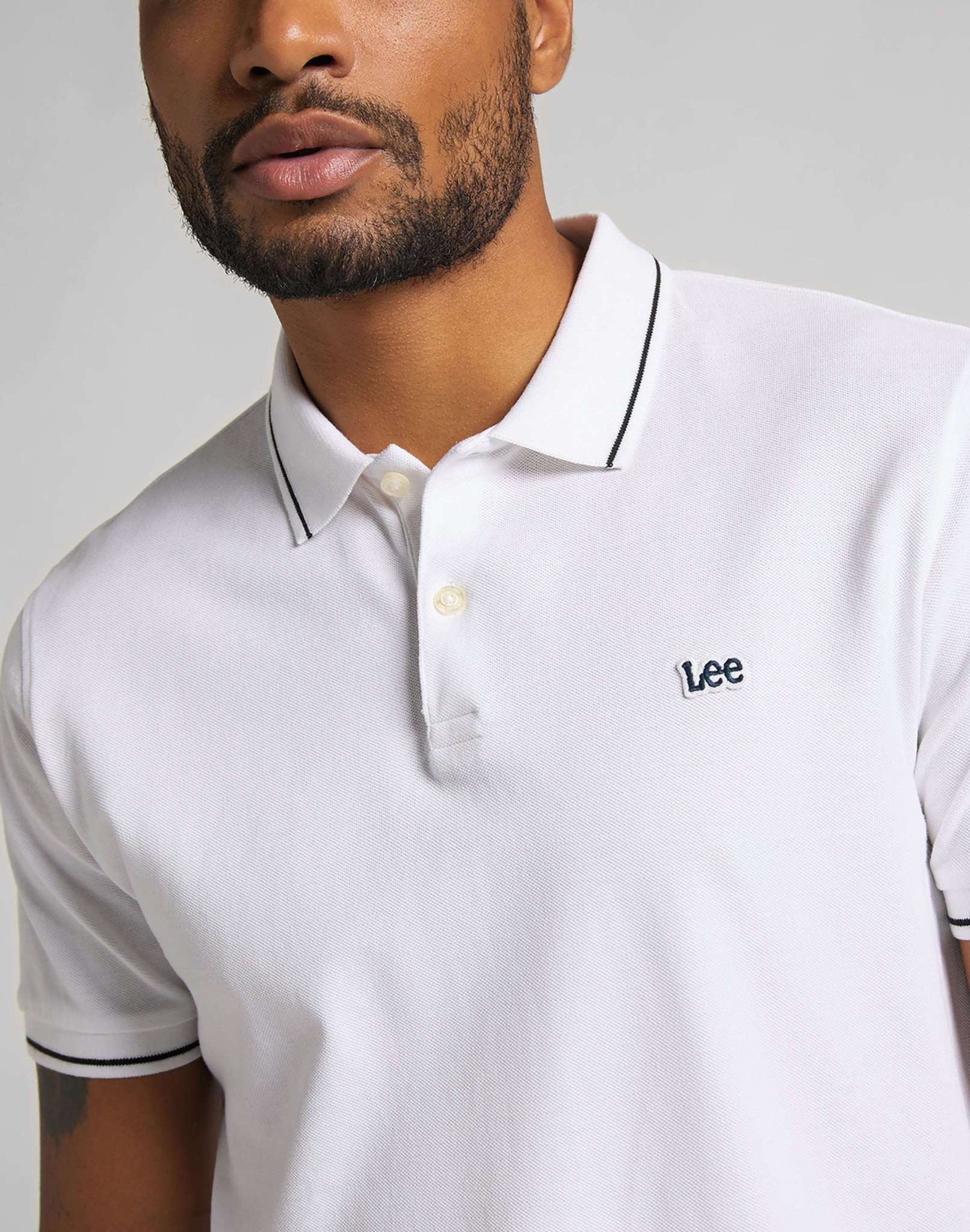 Pique Polo in Bright White Polos Lee   