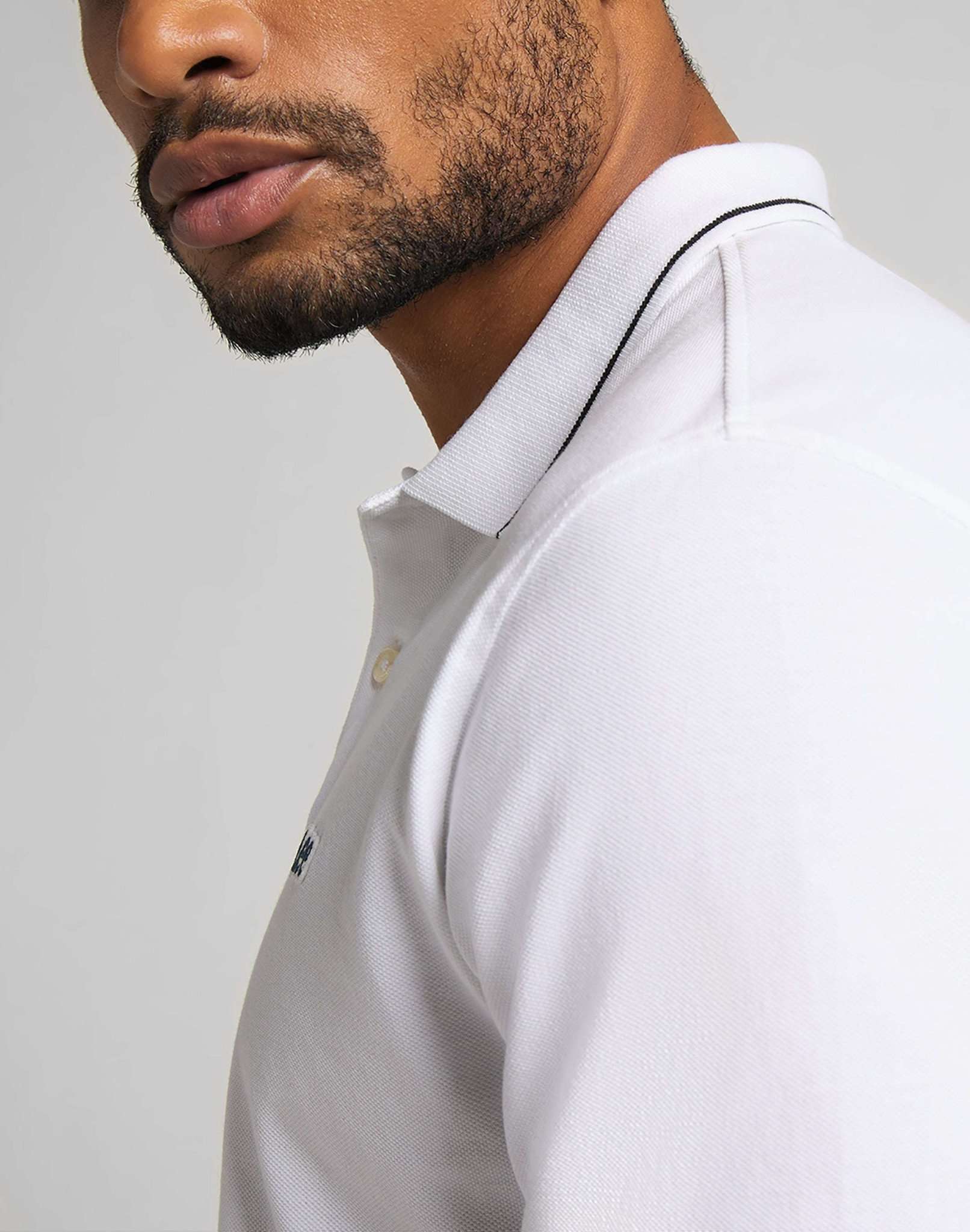 Pique Polo in Bright White Polos Lee   