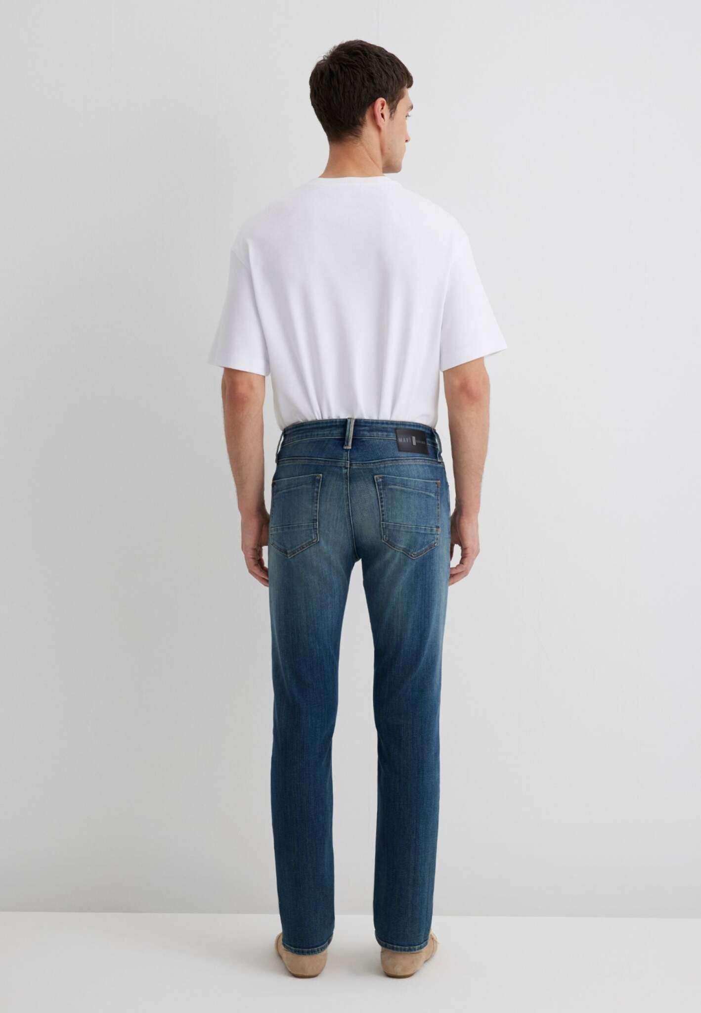 Marcus in Used Indigo Ultra Move Jeans Mavi