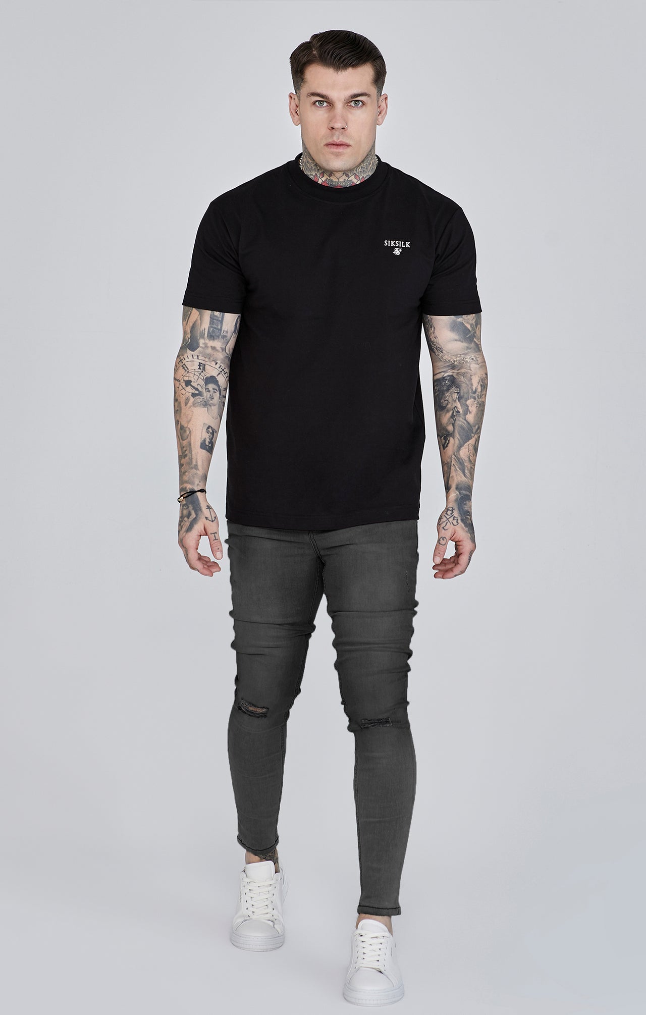 Distressed skinny jeans in gray Jeans SikSilk   