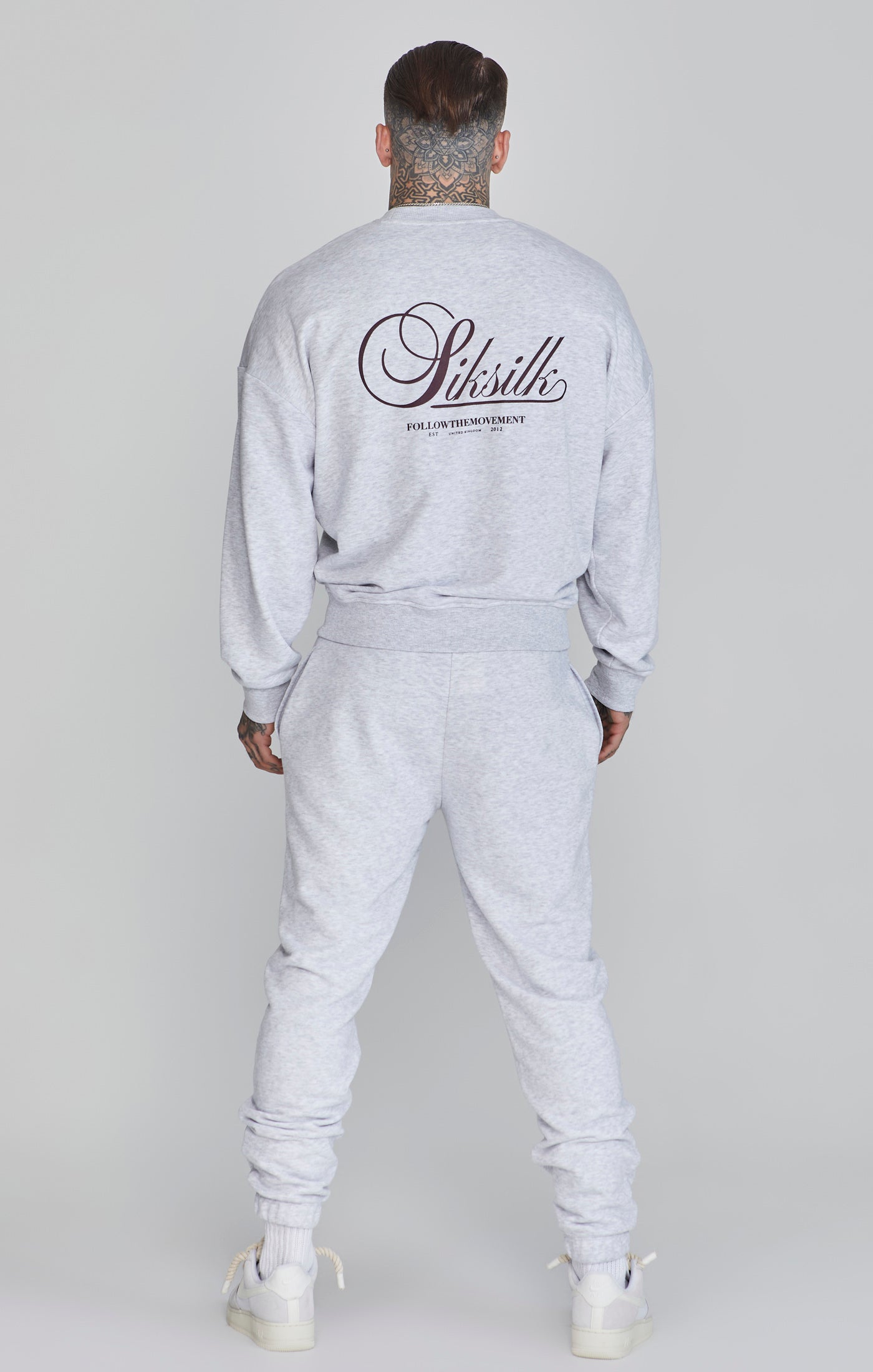 Logo Joggers in Snow Marl Pants SikSilk   