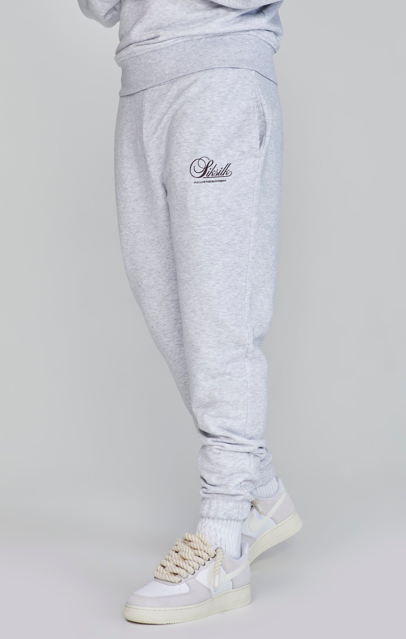 Logo Joggers in Snow Marl Pants SikSilk   