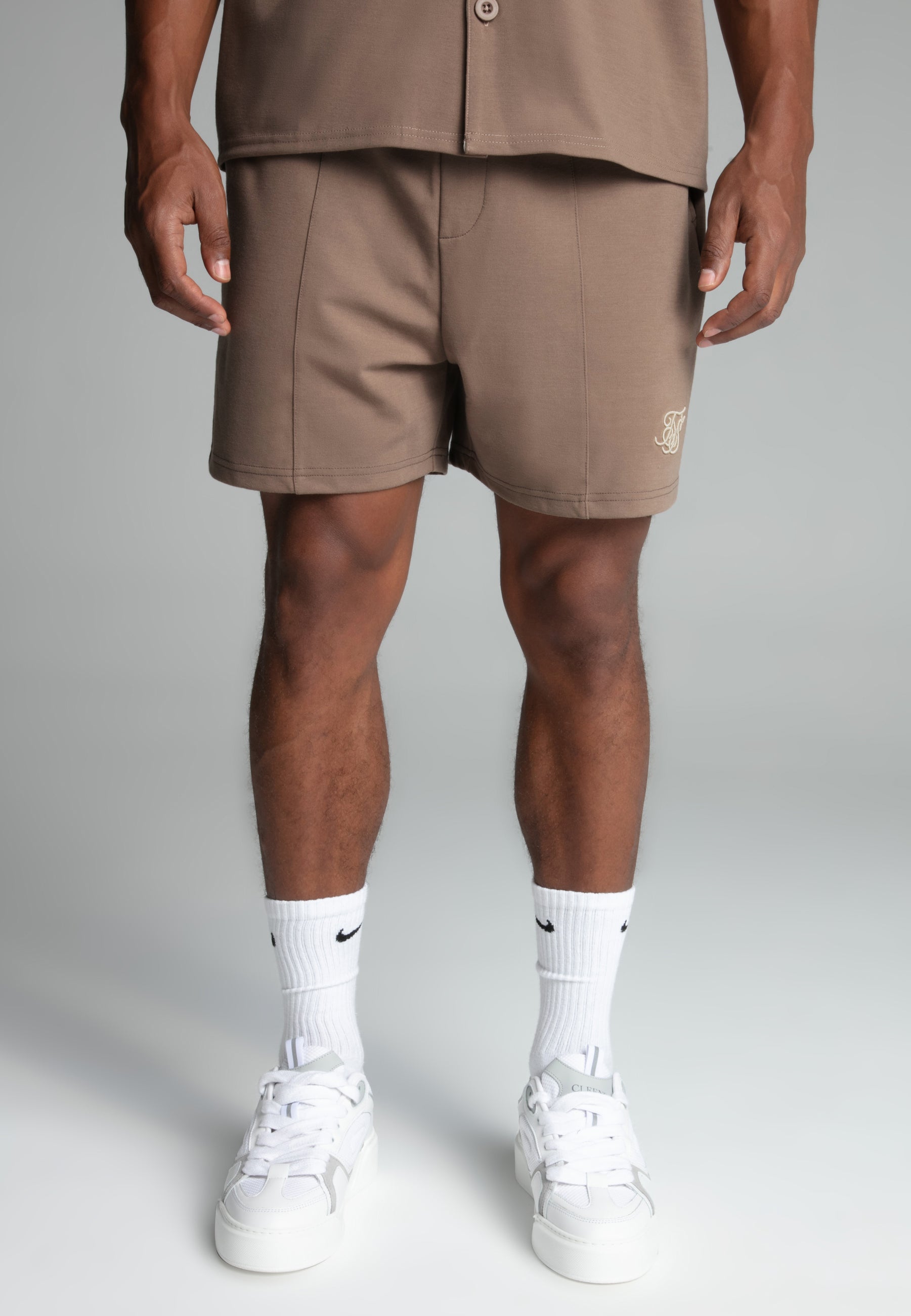 Retro shorts in beige Shorts SikSilk