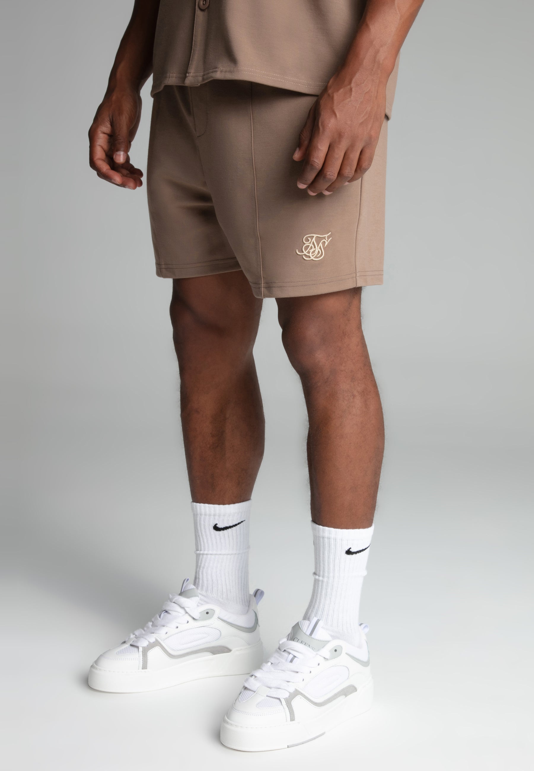 Retro shorts in beige Shorts SikSilk