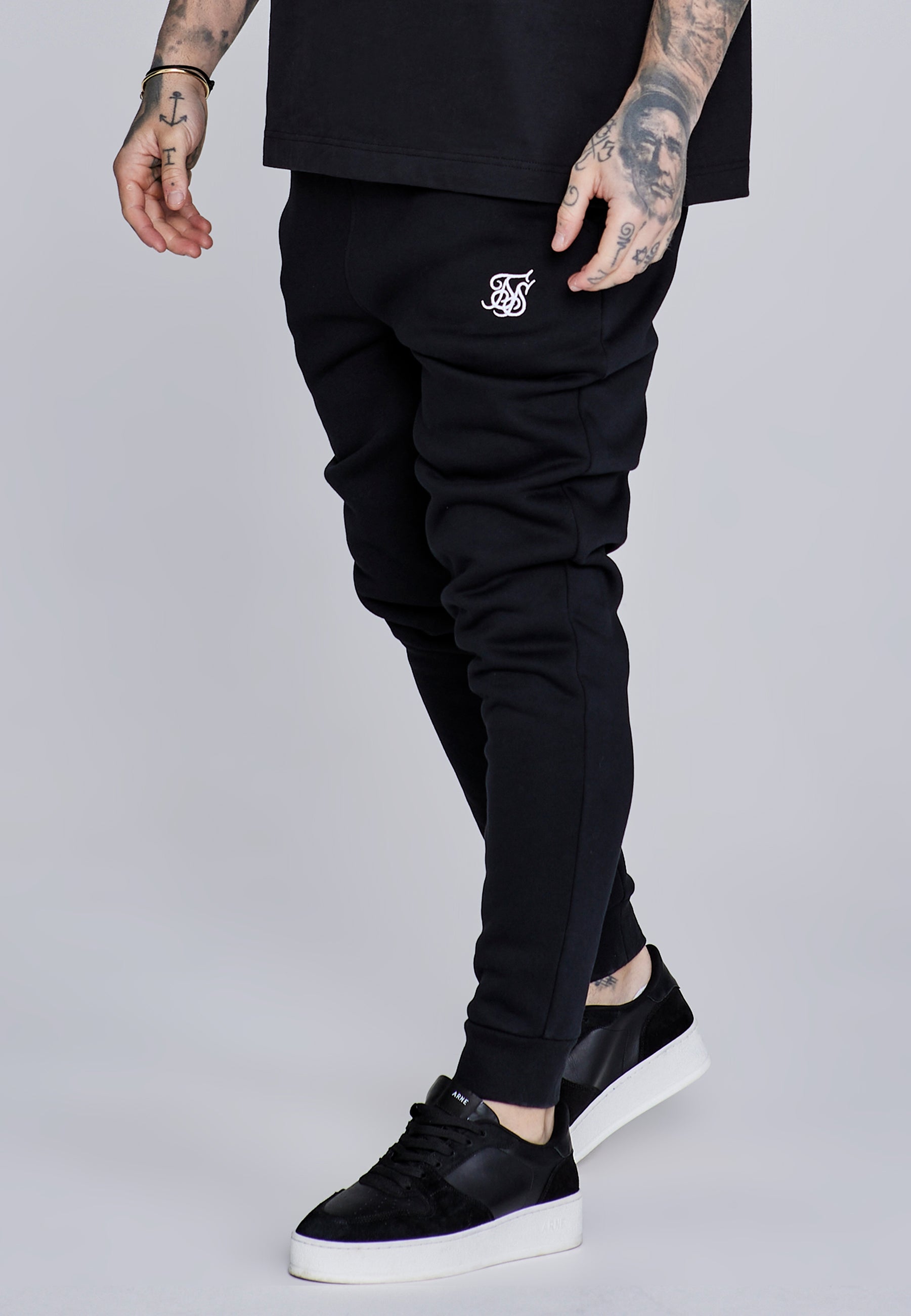 Essentials Joggers in Black Pants SikSilk