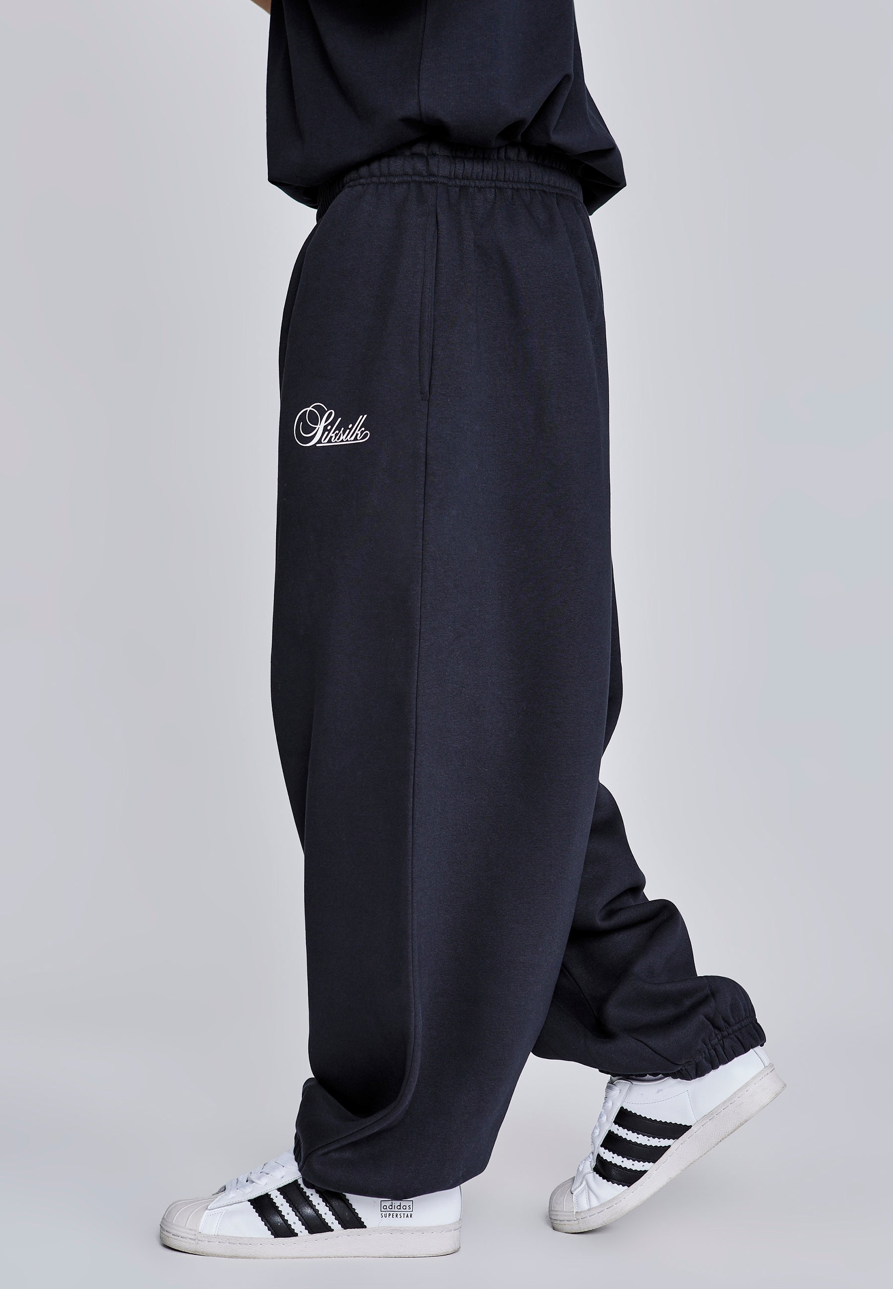 Essentials Joggers in Black Pants SikSilk