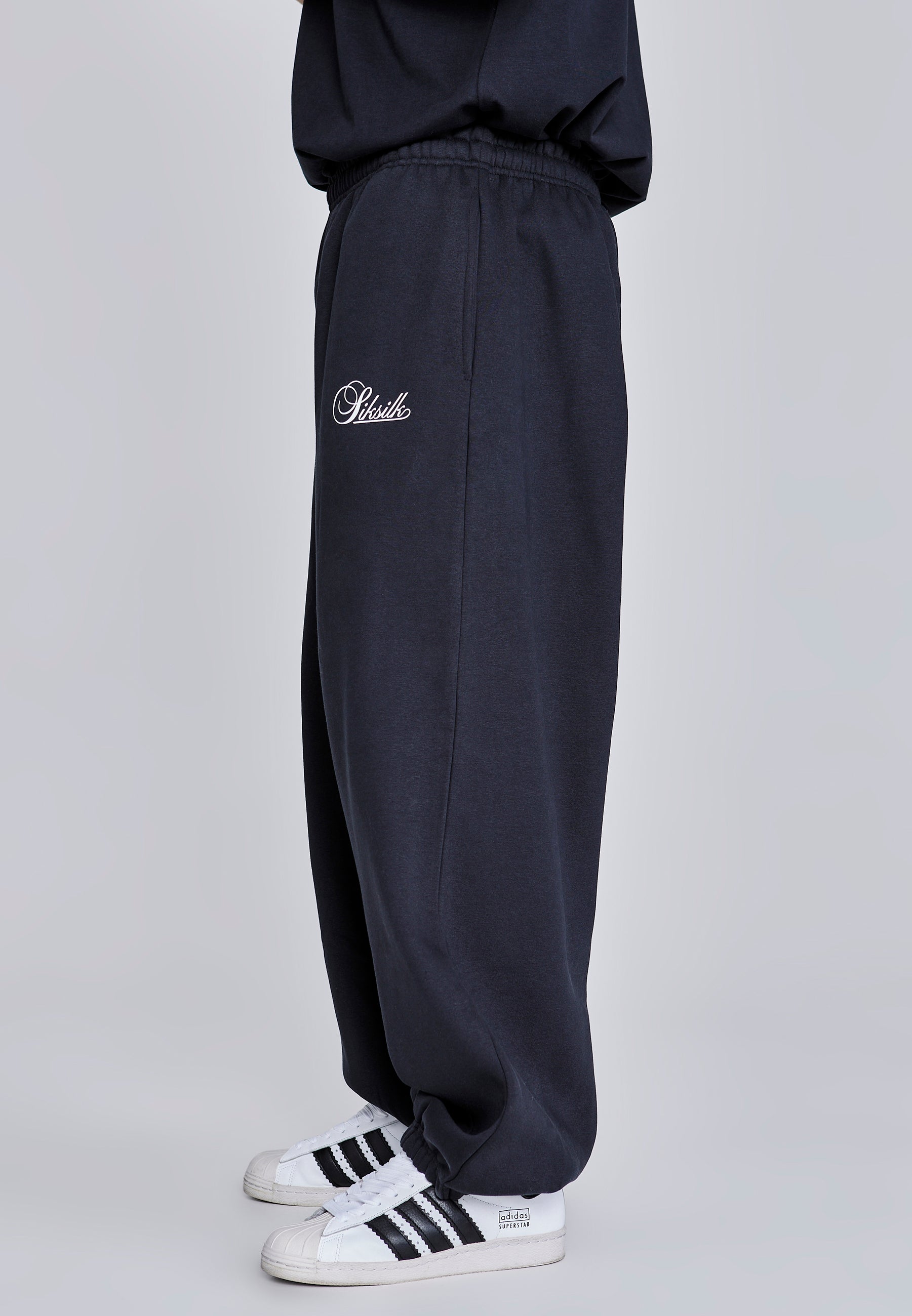 Essentials Joggers in Black Pants SikSilk