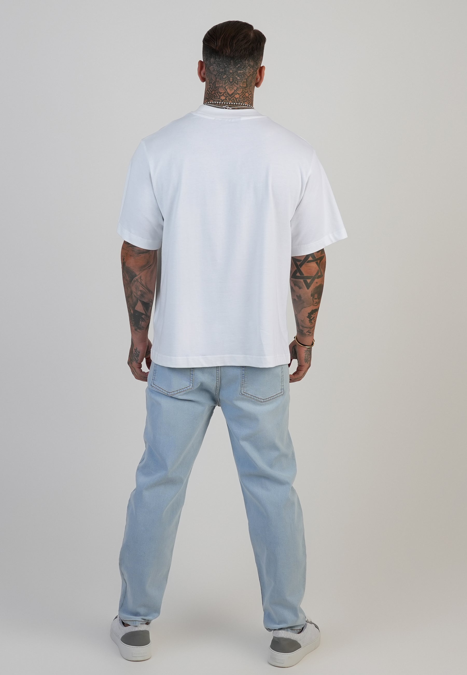 Tapered Fit Jeans in Washed Light Blue Jeans SikSilk