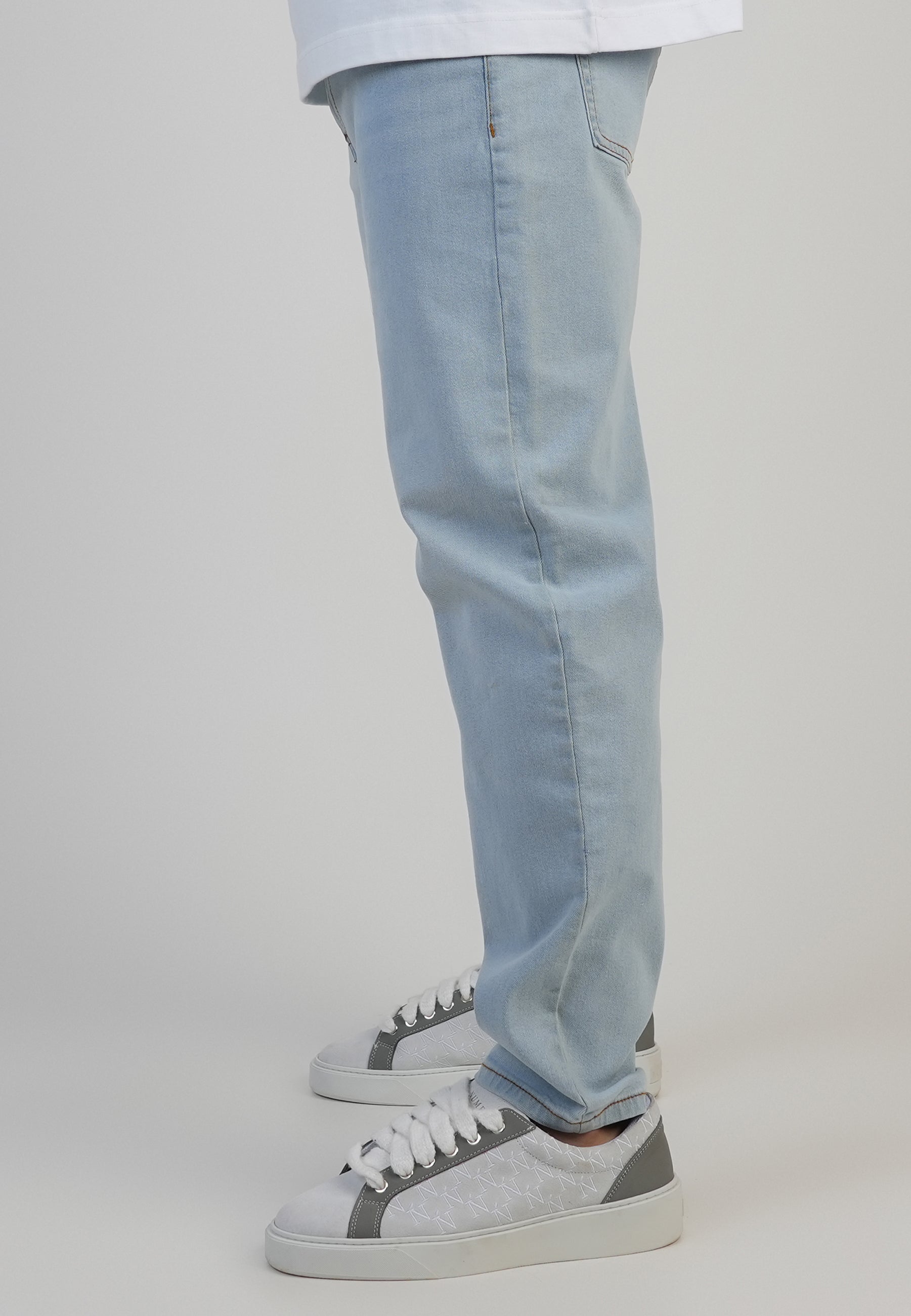 Tapered Fit Jeans in Washed Light Blue Jeans SikSilk